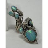 An Art Nouveau style silver and opal ring, Size M This is a modern copy.