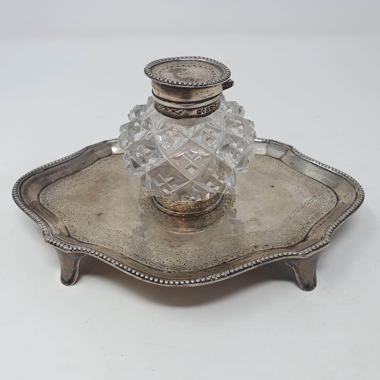 An early 19th century silver inkstand, glass a inkwell, London 1832 Overall condition good, some