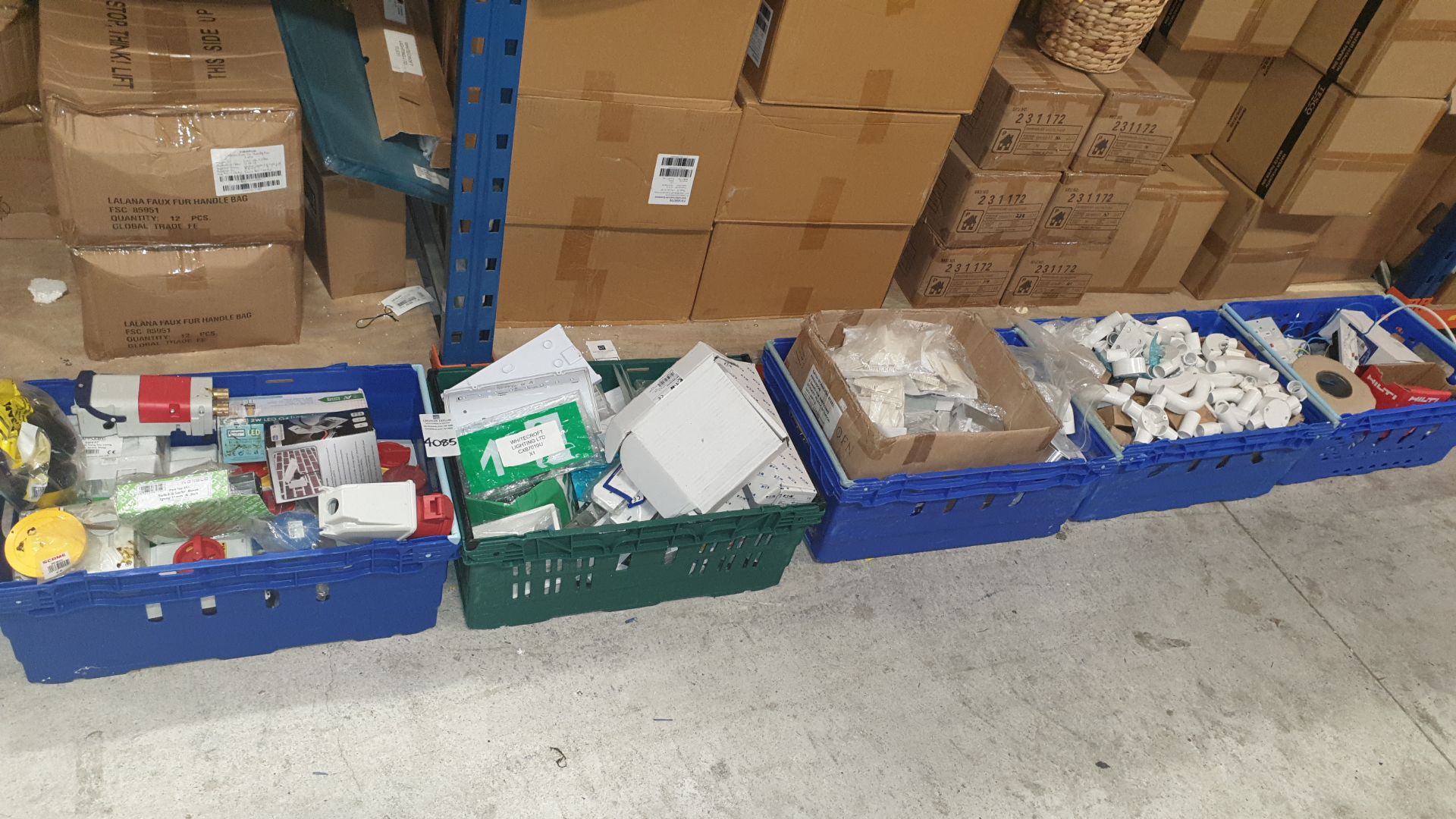 MIXED TRADE LOT IN 5 TRAYS (NOT INCLUDED) CONTAINING SWITCH AND SOCKET BOXES, FIRE EXIT SIGNS,