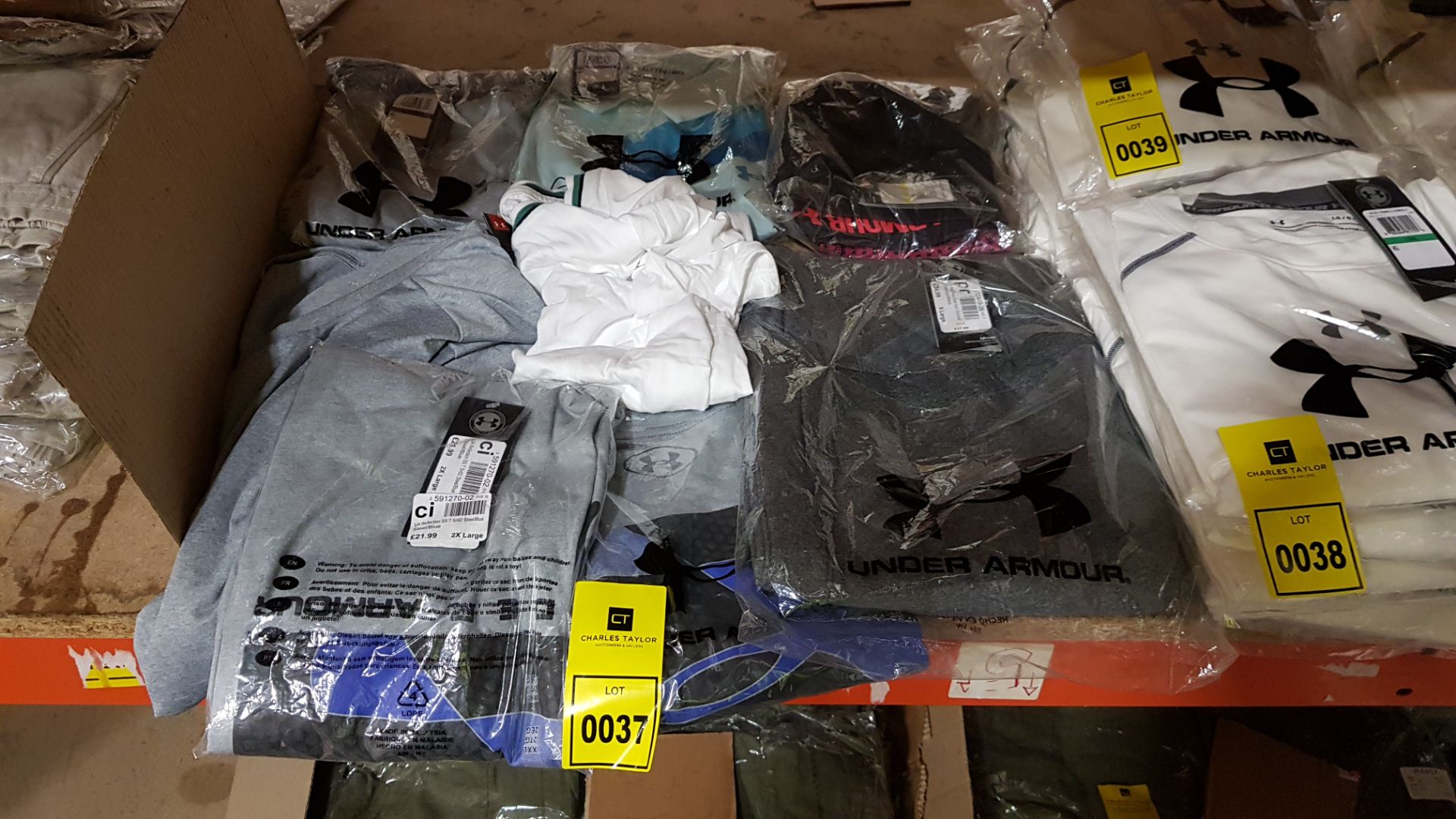 8 X BRAND NEW CLOTHING LOT CONTAINING 1 X JACK & JONES T-SHIFT AND 7 X UNDER ARMOUR SHIRTS AND