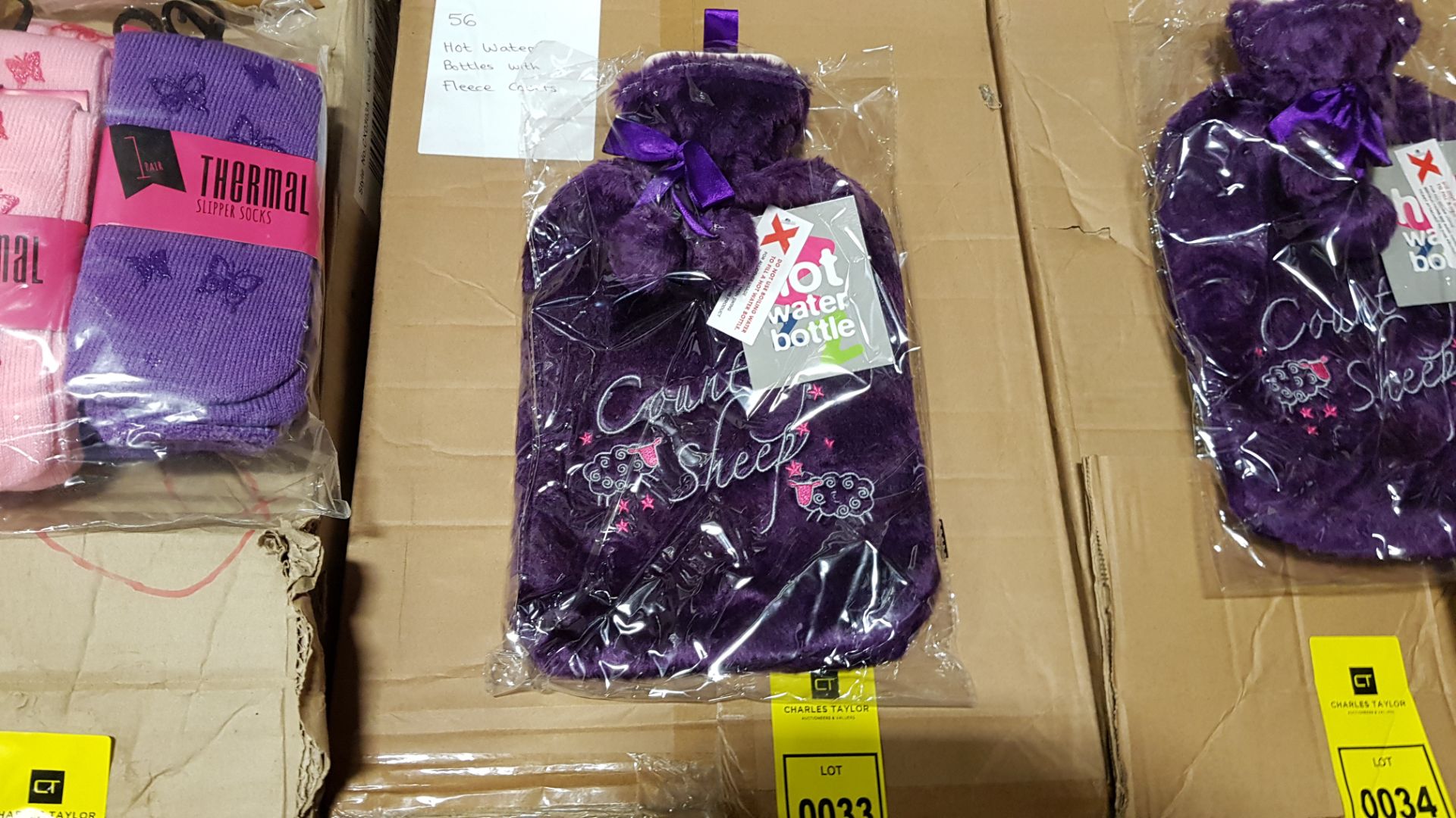 28 X BRAND NEW HOT WATER BOTTLES WITH FLEECE COVERS IN PURPLE