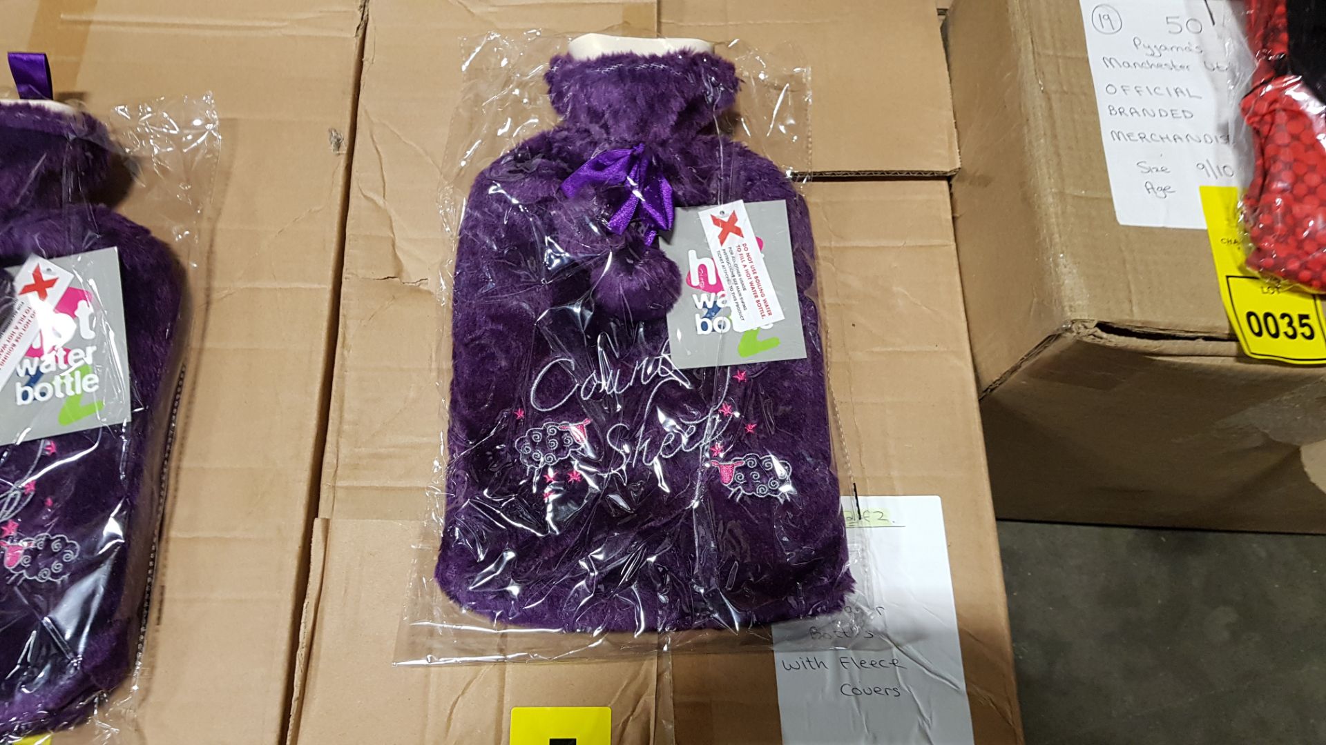 28 X BRAND NEW HOT WATER BOTTLES WITH FLEECE COVERS IN PURPLE
