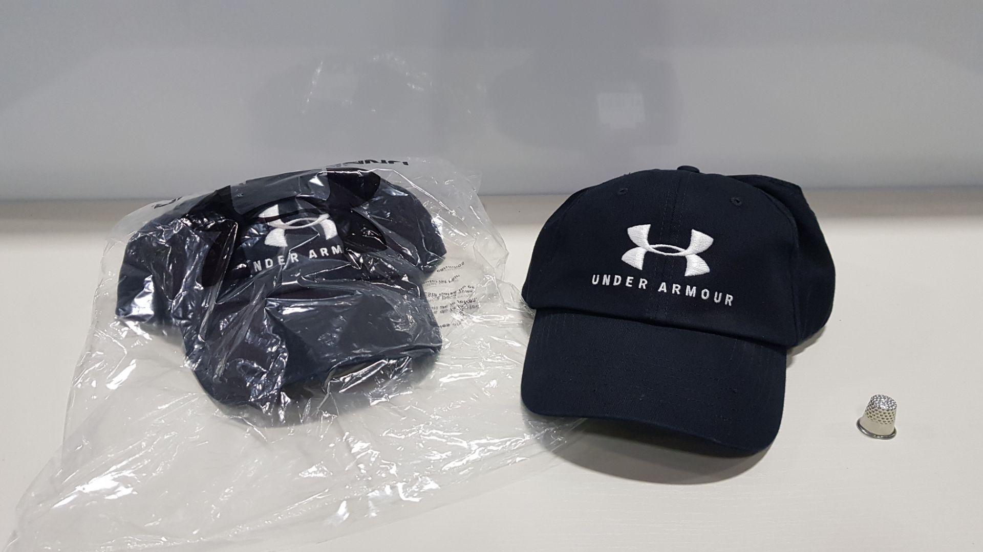 10 X BRAND NEW BAGGED UNDER ARMOUR UA FREE CAPS RRP £17.99