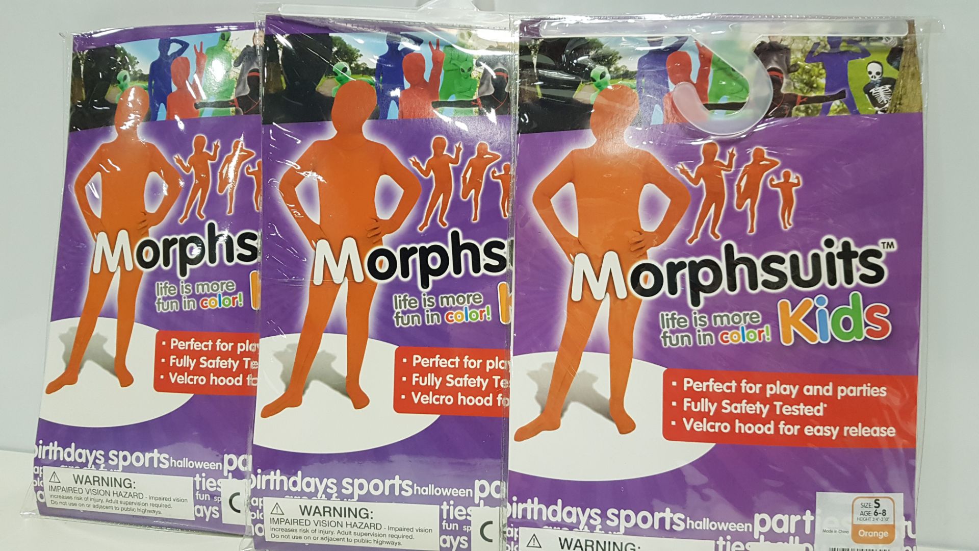 24 X BRAND NEW KIDS ORANGE MORPHSUITS (PICK LOOSE FROM ONE BOX)