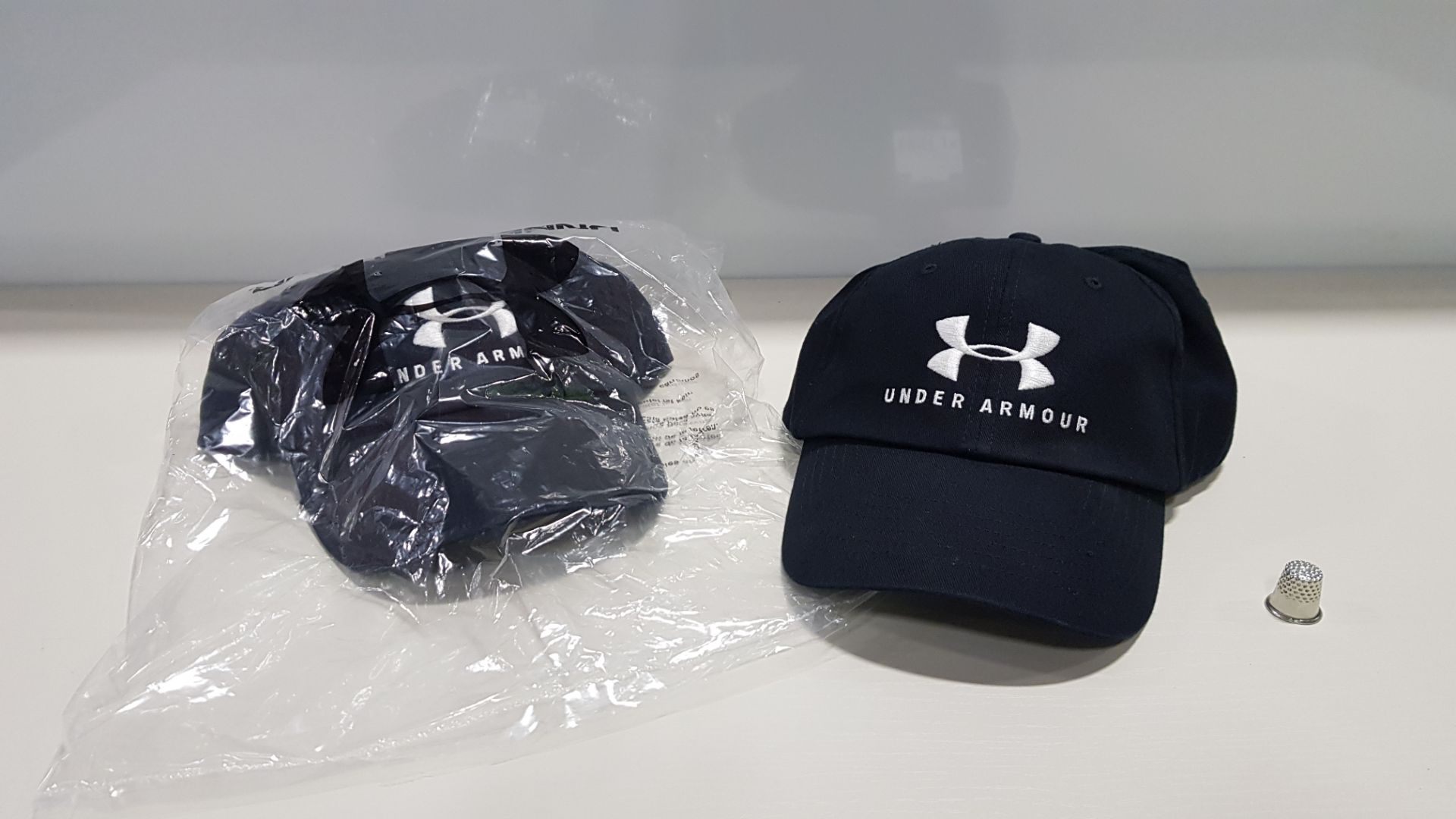 10 X BRAND NEW BAGGED UNDER ARMOUR UA FREE CAPS RRP £17.99