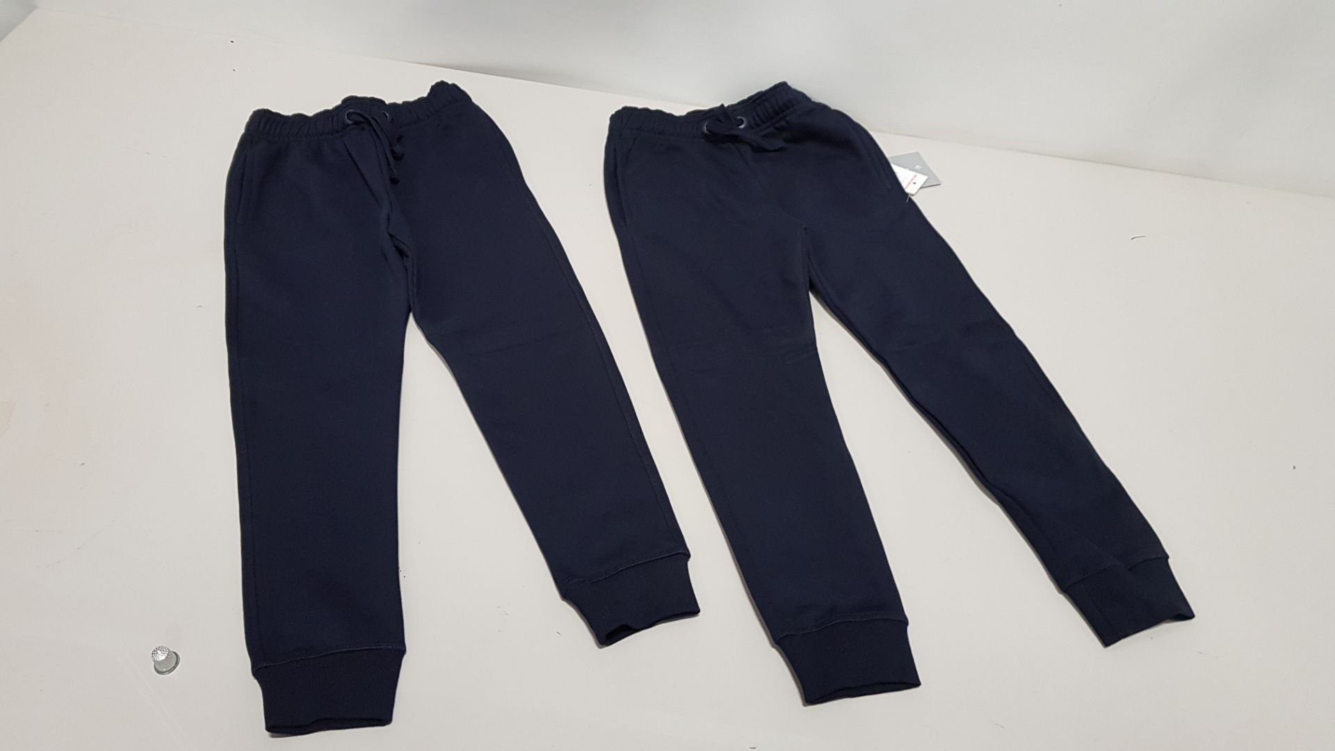 £400 MIN RETAIL VALUE OF CHILDRENS JOGGERS IN VARIOUS STYLES & SIZES IN 5 TRAYS (NOT INCLUDED)