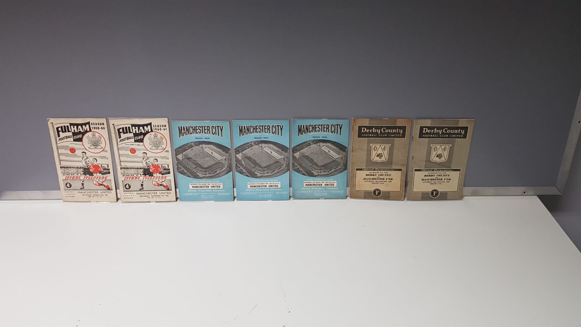 7 X MANCHESTER UNITED AWAY PROGRAMMES FROM THE 1960 SEASON TO INCLUDE - 2 X DERBY COUNTY, 3 X