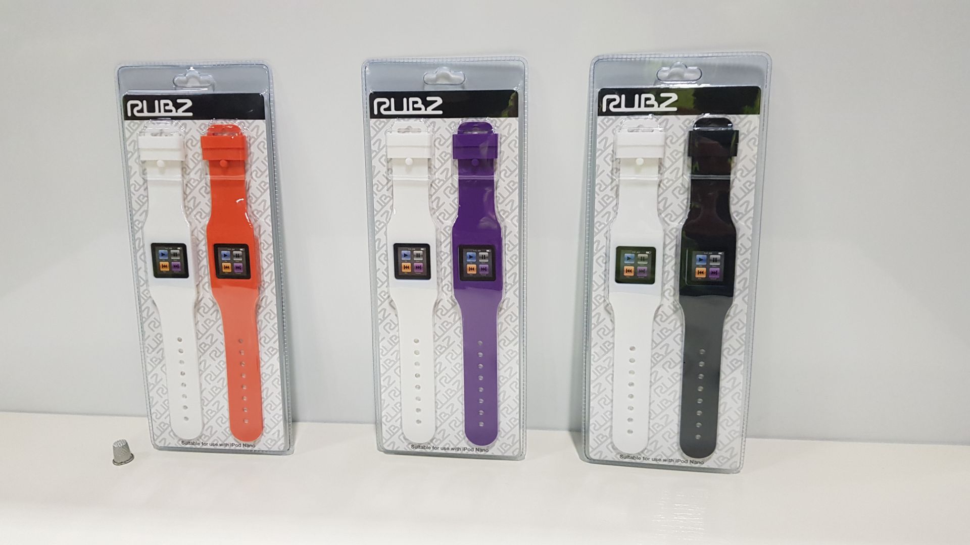 250 X BRAND NEW RUBZ SET OF 2 RUBBER ELECTRONIC WATCH CASES SUITABLE FOR USE WITH IPOD NANO IN 5