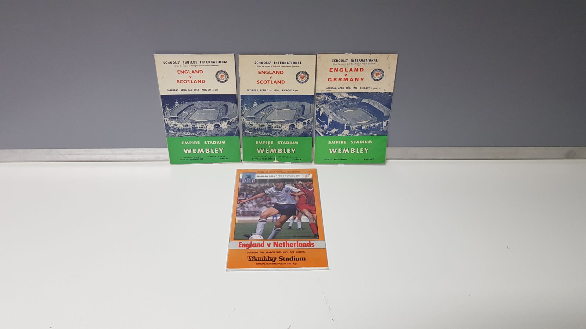 4 X OTHER PROGRAMMES IN VERY GOOD CONDITION TO INCLUDE - ENGLAND VS NETHERLANDS 8TH MARCH 1986/