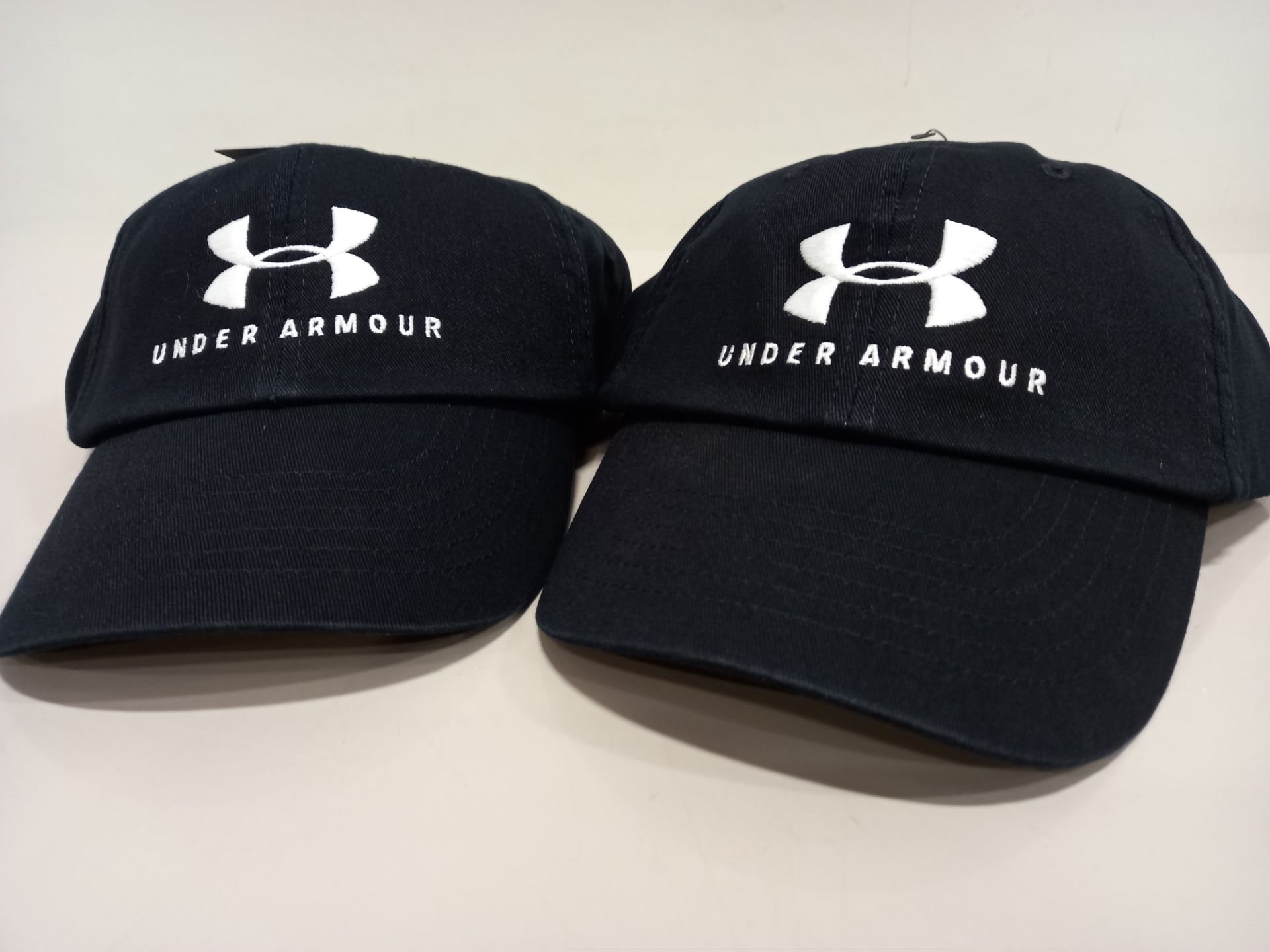 15 X BRAND NEW BAGGED UNDER ARMOUR BLACK CAPS - WOMEN'S - (PICK LOOSE) RRP £17.99 EACH - TOTAL £