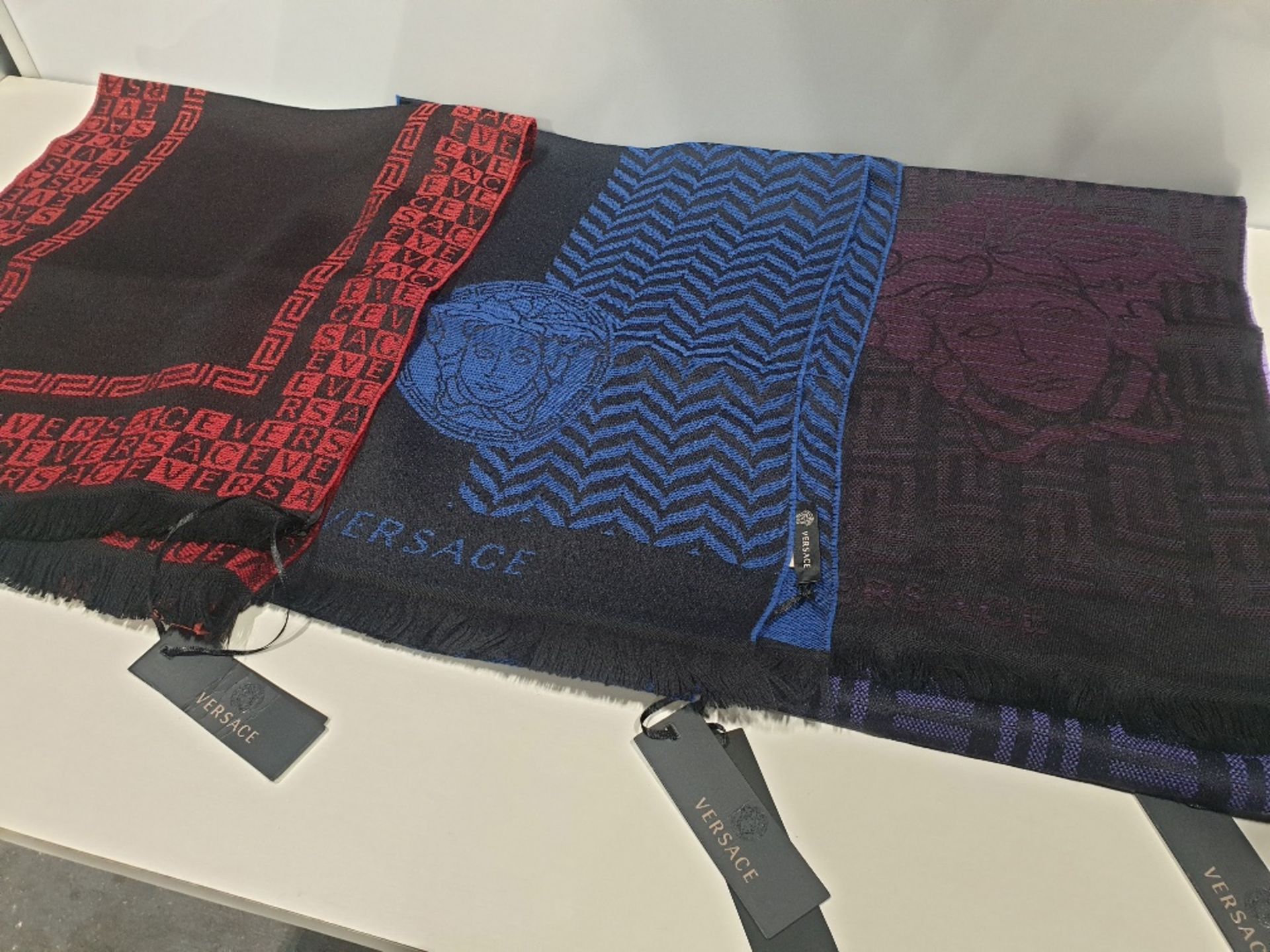 3 X BRAND NEW VERSACE WOOL SCARVES WITH TAGS IN ASSORTED COLOURS PURPLE, BLUE & RED - UNISEX RRP: £
