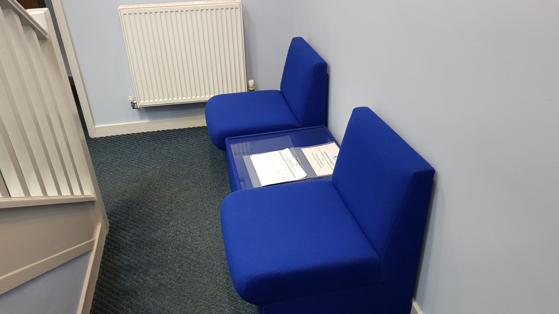 2 X BLUE FABRIC OFFICE CHAIRS, 1 X BLUE FABRIC GLASS TOPPED COFFEE TABLE