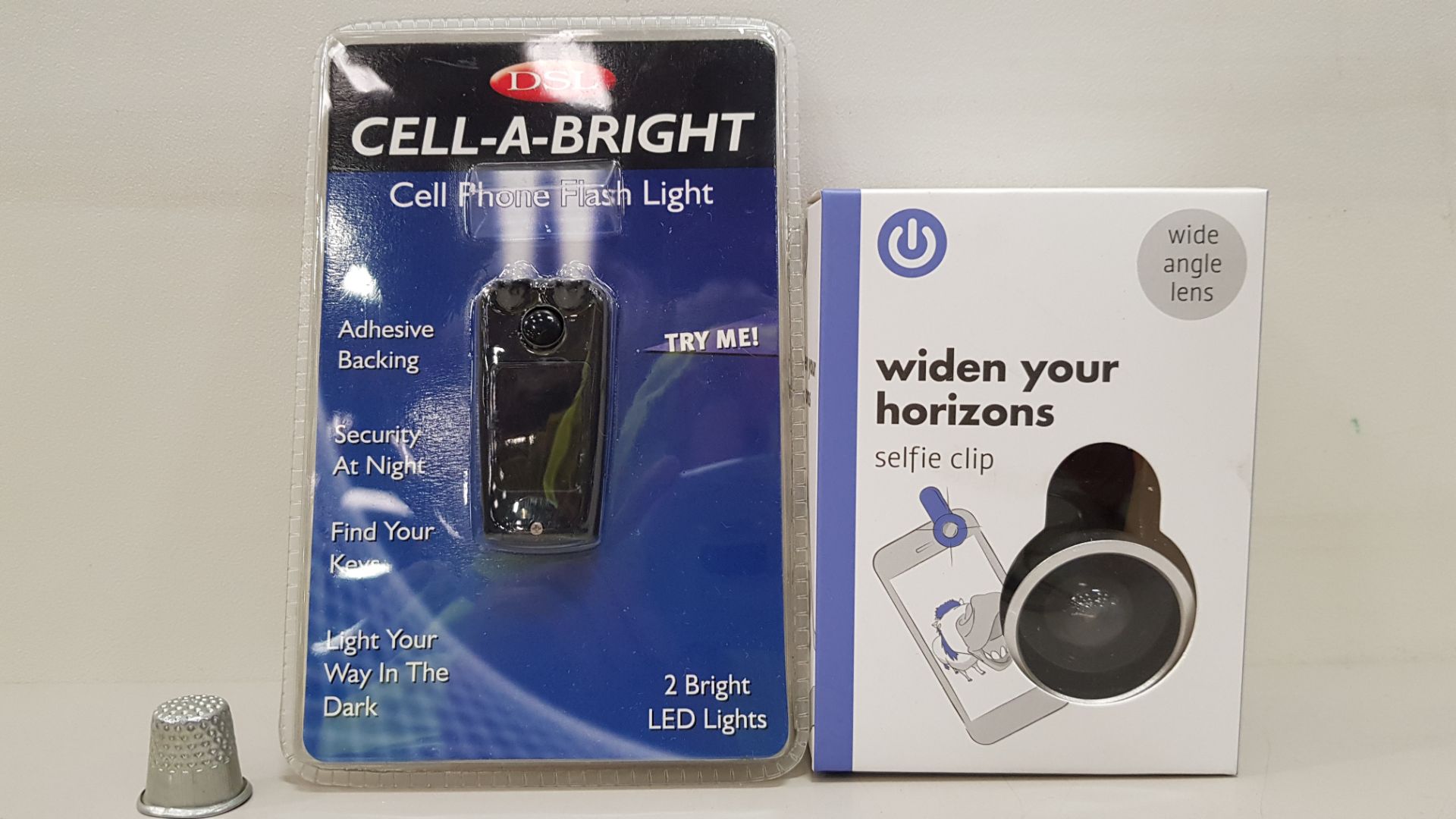 100 X BRAND NEW DSL CELL- A- BRIGHT CELL PHONE FLASH LIGHT AND 64 X BRAND NEW WIDEN YOUR HORIZON