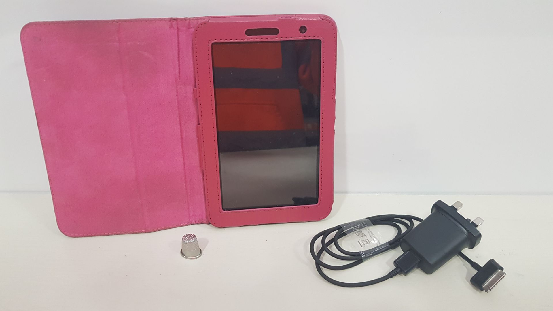 SAMSUNG GALAXY TABLET INCLUDES A CASE AND CHARGER