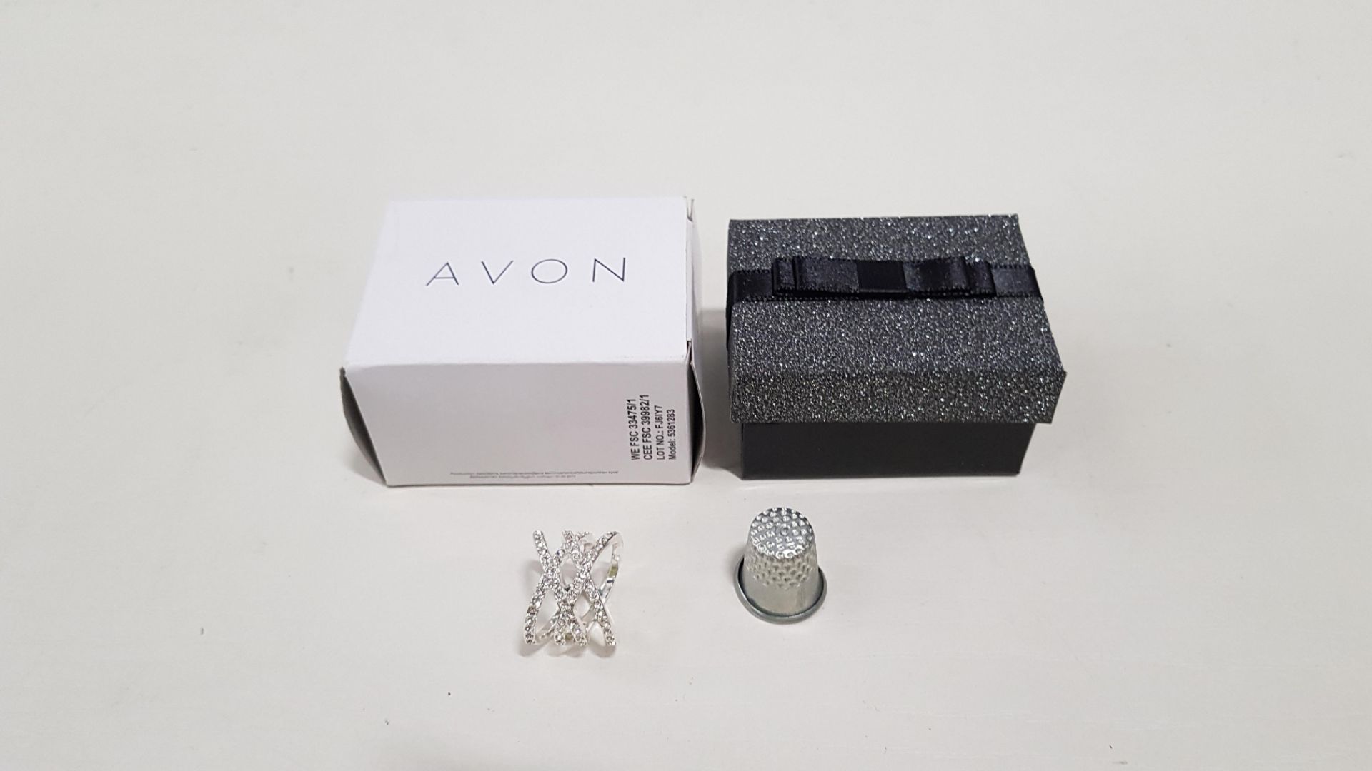 170 X BRAND NEW AVON EVERLY CROSSOVER RINGS SIZE 6