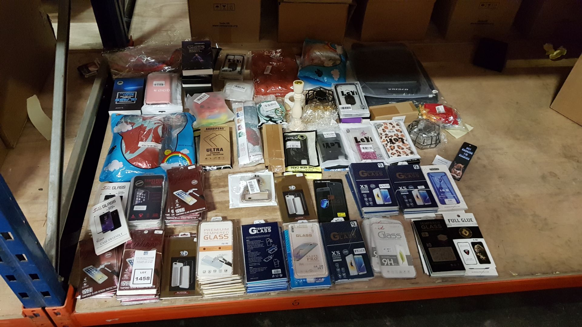 LARGE QUANTITY ASSORTED LOT CONTAINING VARIOUS PHONE CASES AND TEMPERED GLASS SCREEN PROTECTORS.