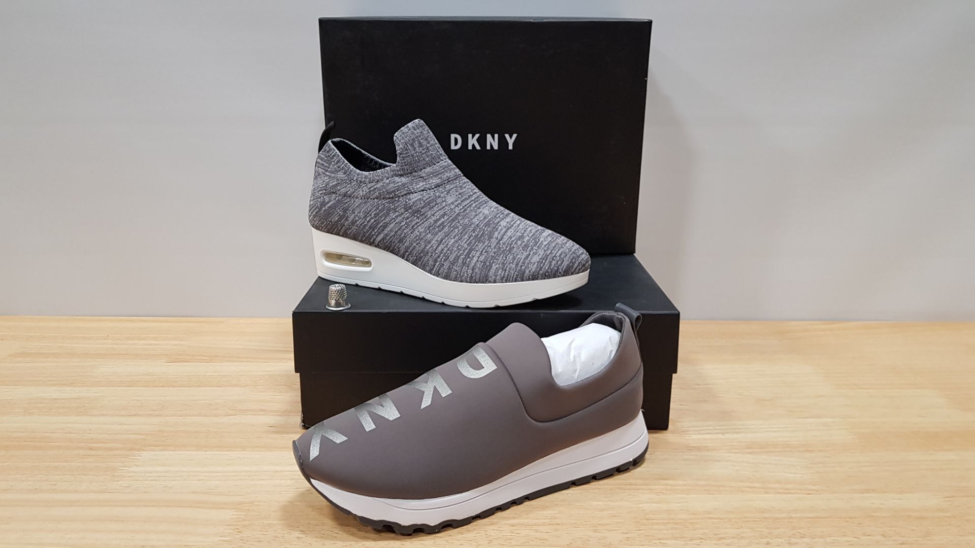 4 PIECE MIXED DKNY TRAINER LOT CONTAINING 2 X ANJI WEDGE SNEAKERS AND 2 X JADYN SLIP ON JOGGING