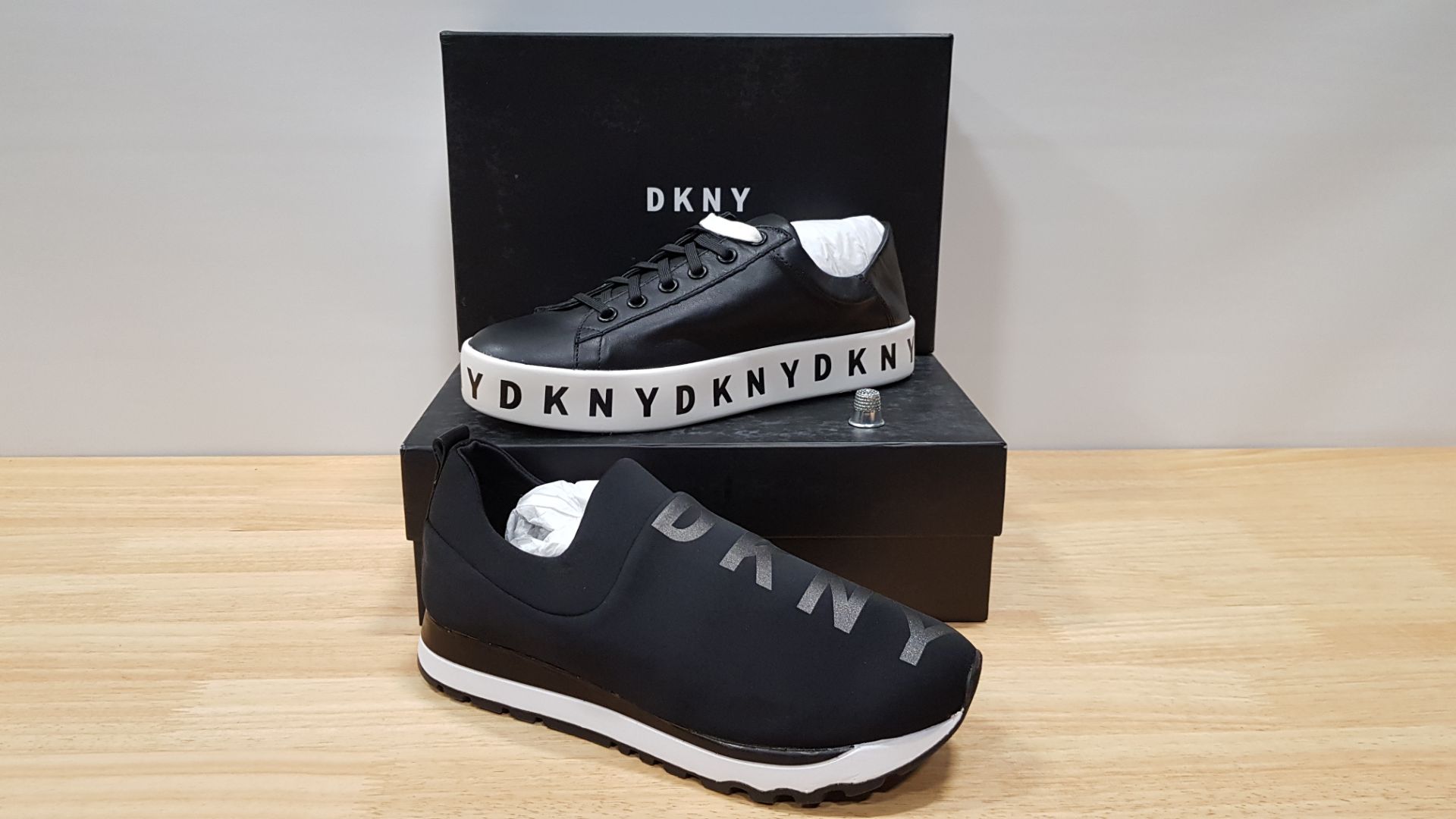 4 PIECE MIXED DKNY TRAINER LOT CONTAINING 2 X BANSON LACE UP SNAEAKERS AND 2 X JADYN SLIP ON JOGGING