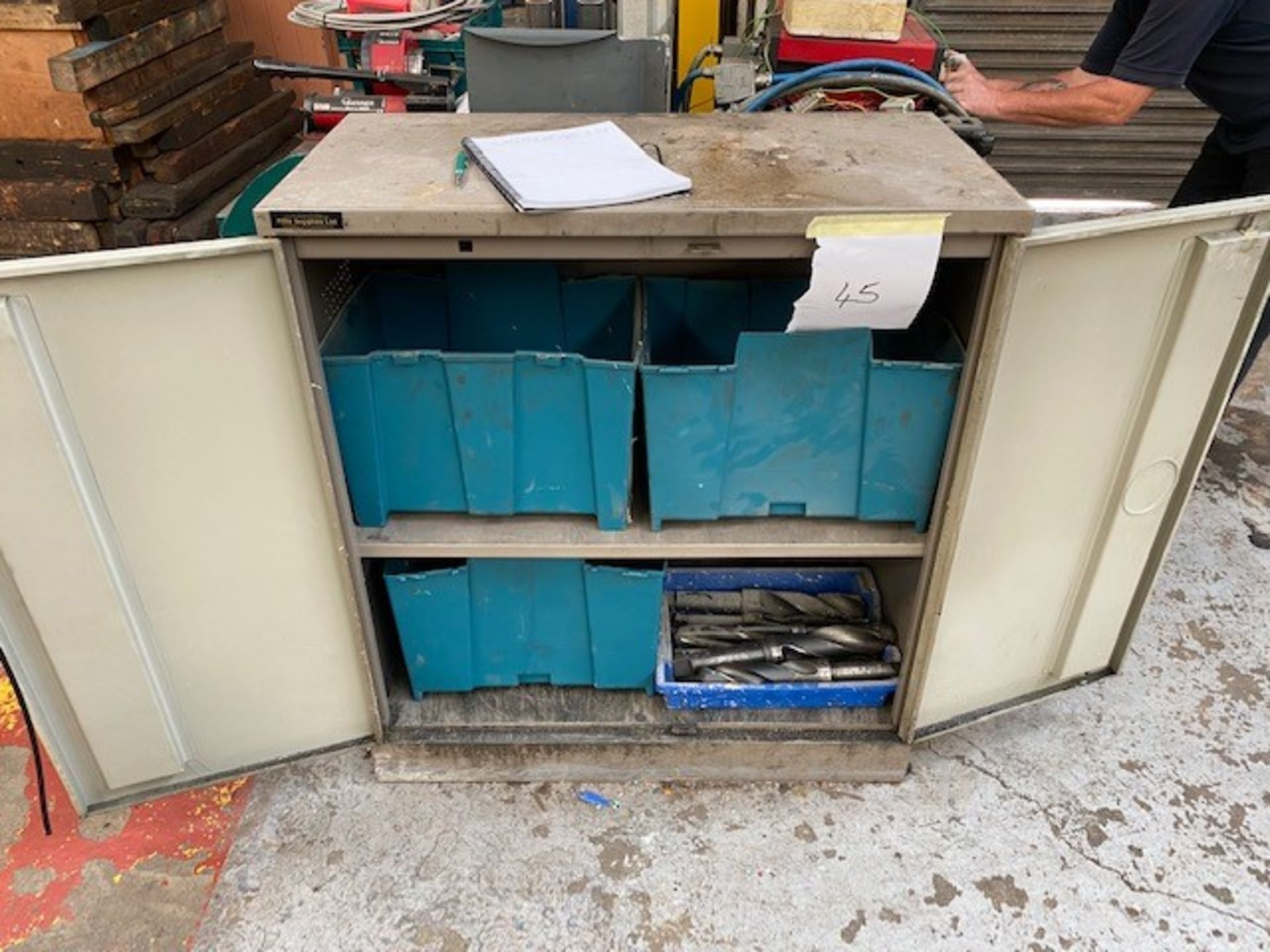 METAL CABINET WITH SELECTION OF LARGE DRILL BITS