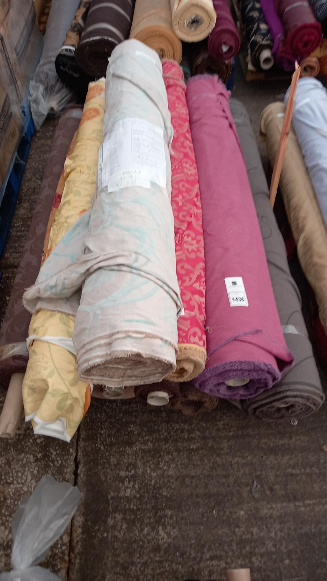 FULL PALLET CONTAINING 12 ROLLS OF ASSORTED FABRICS IN VARIOUS STYLES IE WAVE DESIGN, CHOCOLATE,