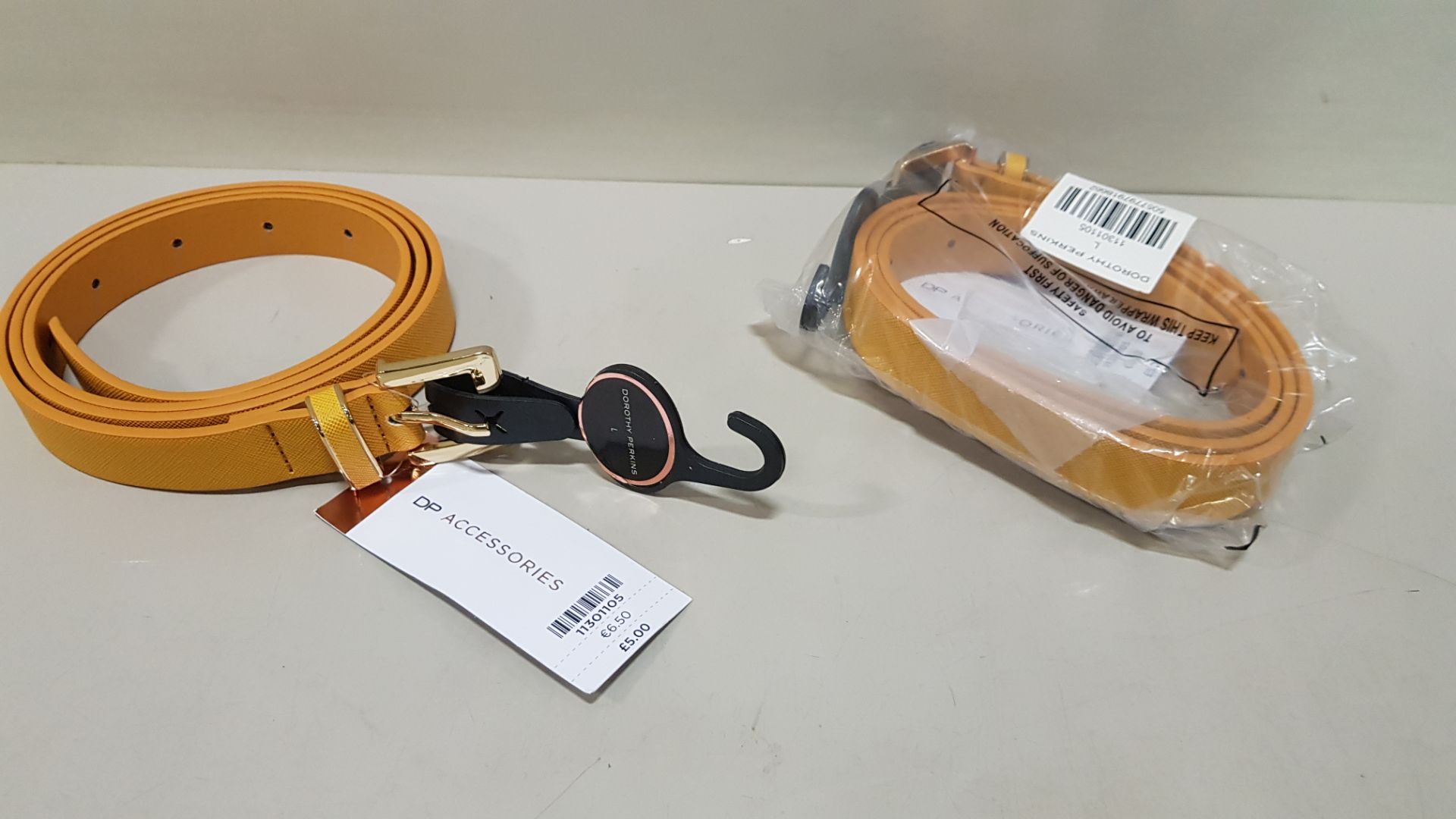 150 X BRAND NEW DOROTHY PERKINS MUSTARD BELTS SIZE LARGE RRP £5.00 (TOTAL RRP £750.00)