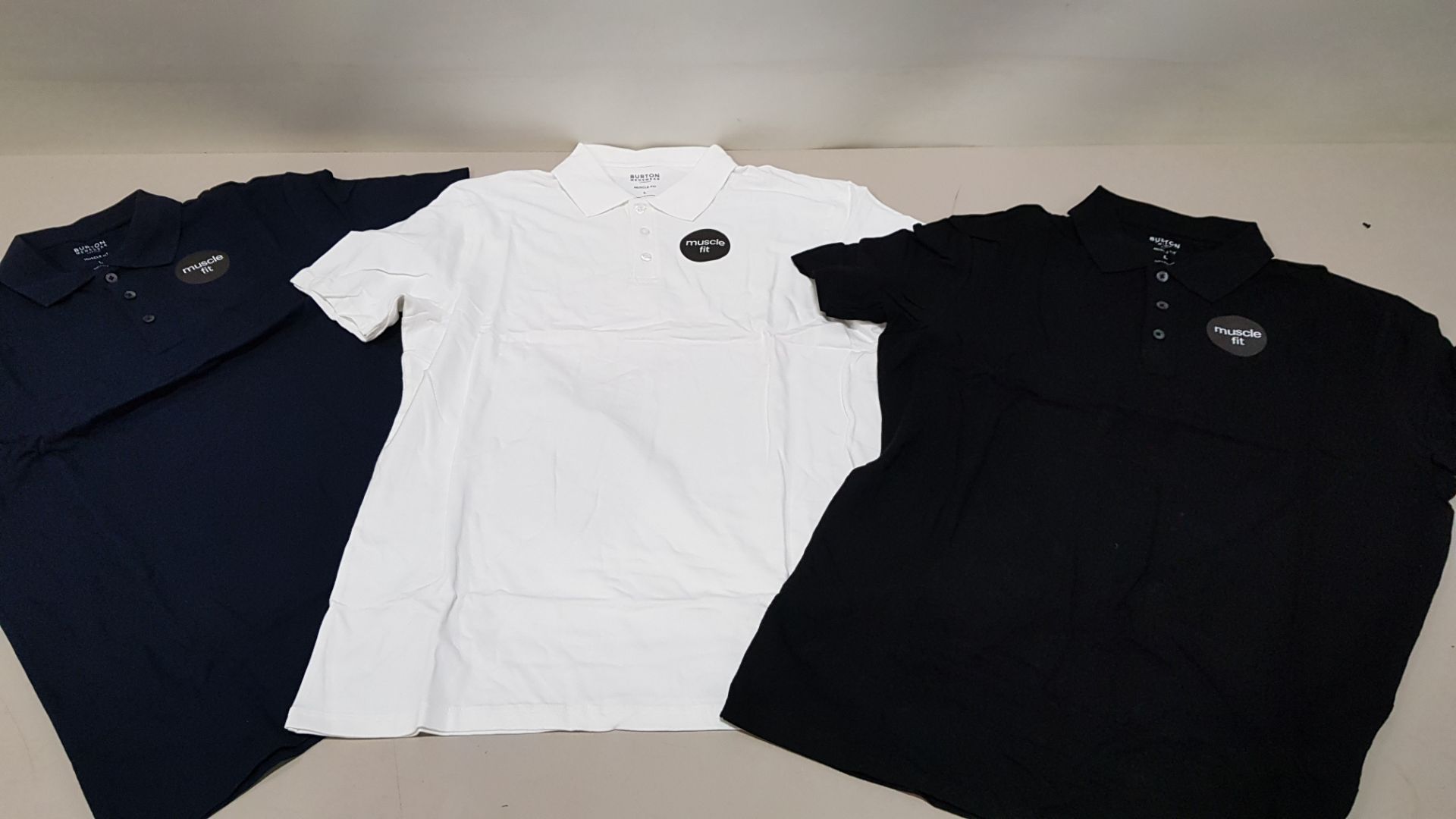 75 X BRAND NEW BURTON MENSWEAR MUSCLE FIT POLO SHIRTS IN NAVY, WHITE AND BLACK SIZE SMALL AND