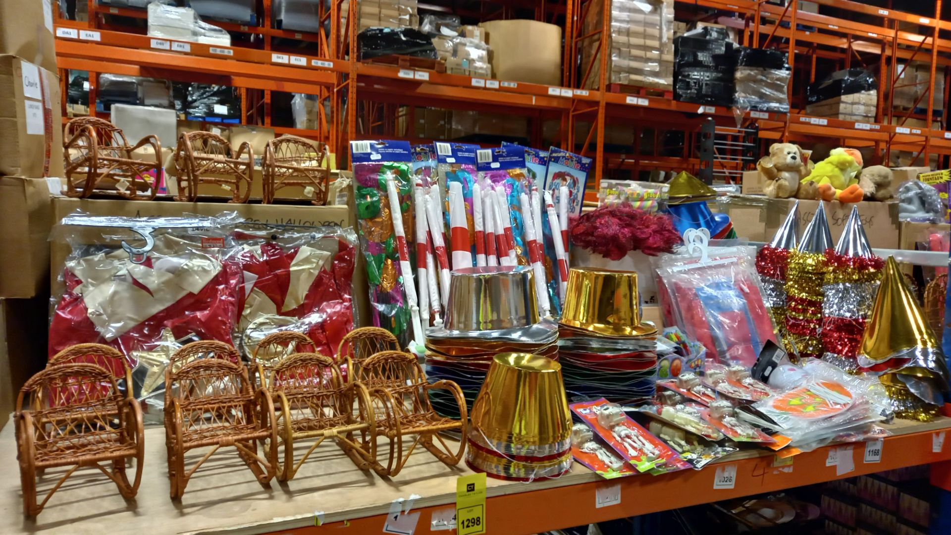 LARGE SELECTION OF PARTY PRODUCTS ON 3/4 SHELF IE. CONE & PORK PIE HATS, FEZES, STREAMERS, WATER