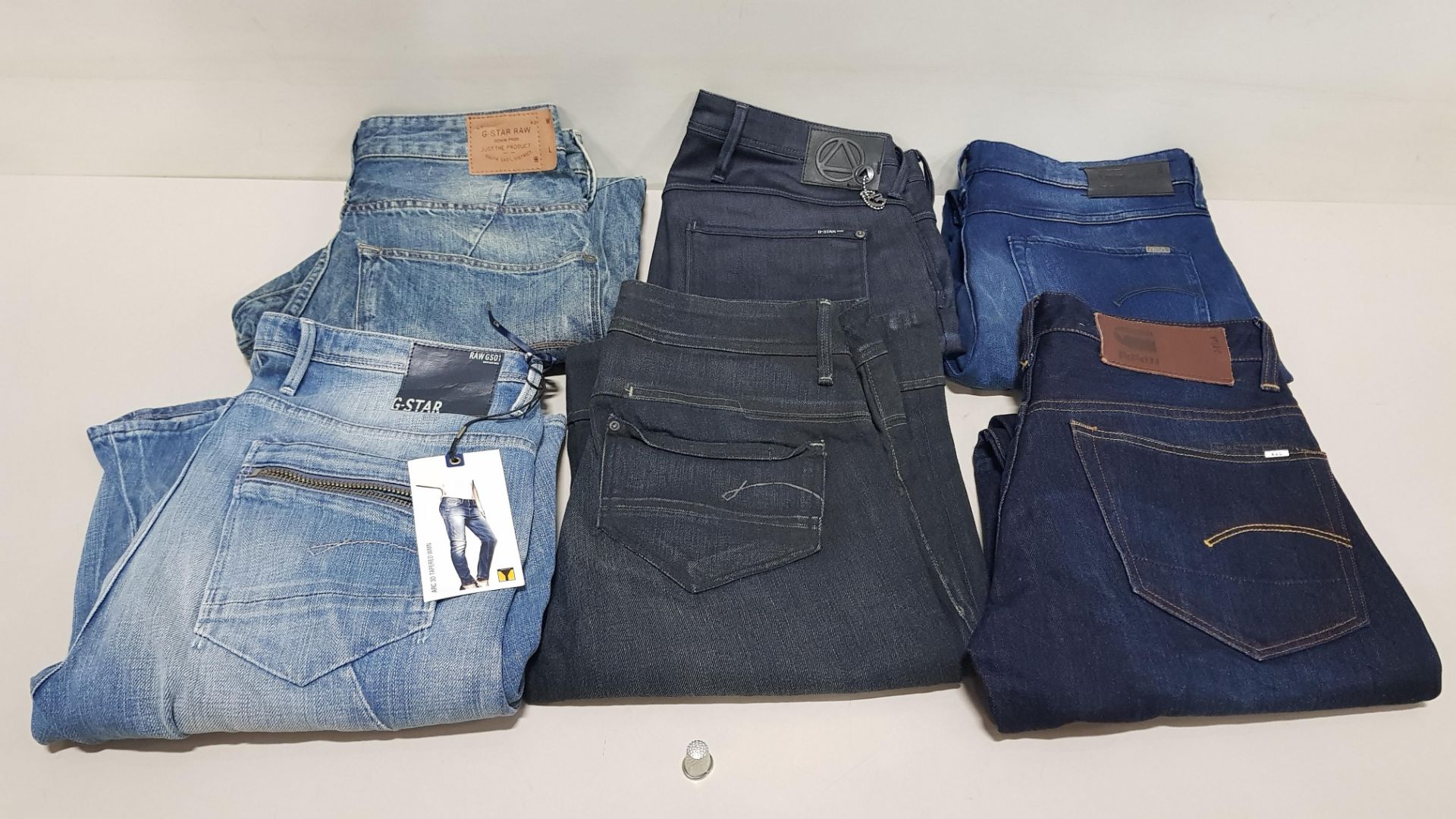 6 X PAIRS OF BRAND NEW G-STAR RAW JEANS IN VARIOUS STYLES & COLOURS IE. LIGHT BLUE, DARK BLUE AND