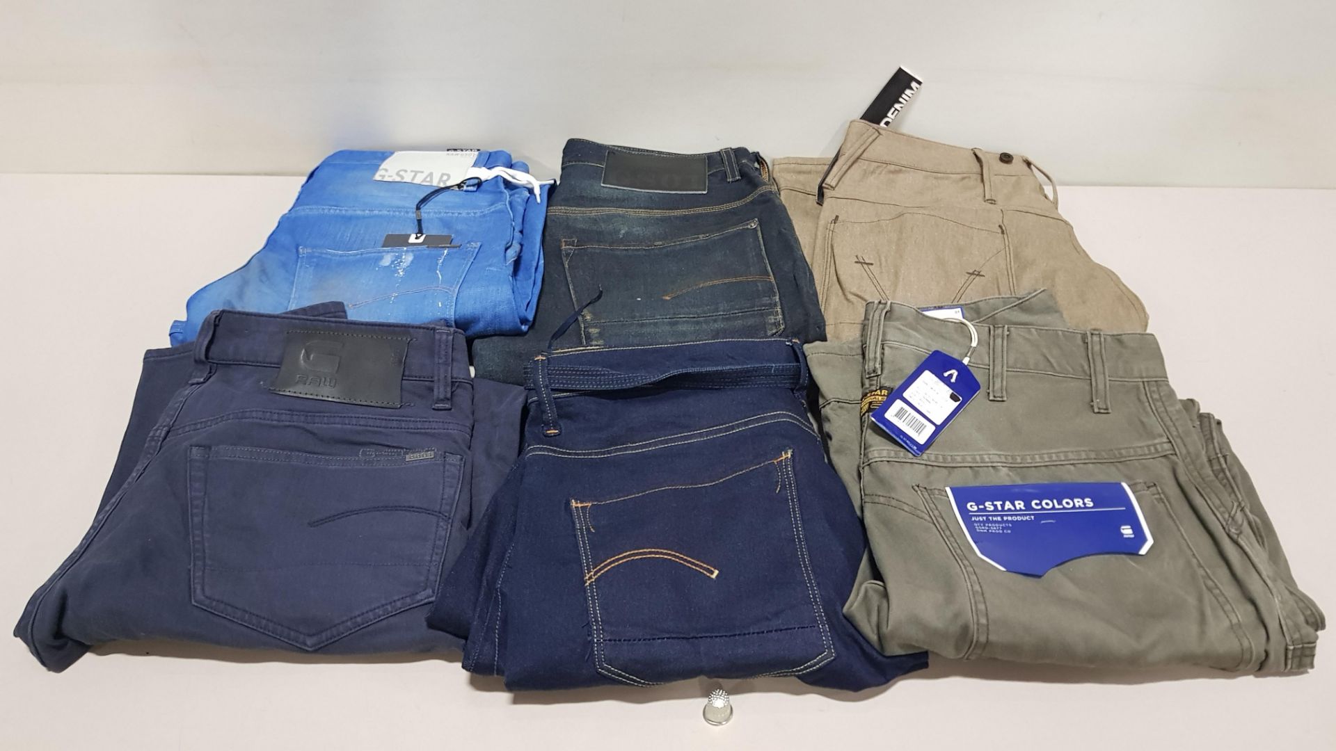 6 X PAIRS OF BRAND NEW G-STAR RAW JEANS IN VARIOUS STYLES & COLOURS IE. LIGHT BLUE, DARK BLUE AND