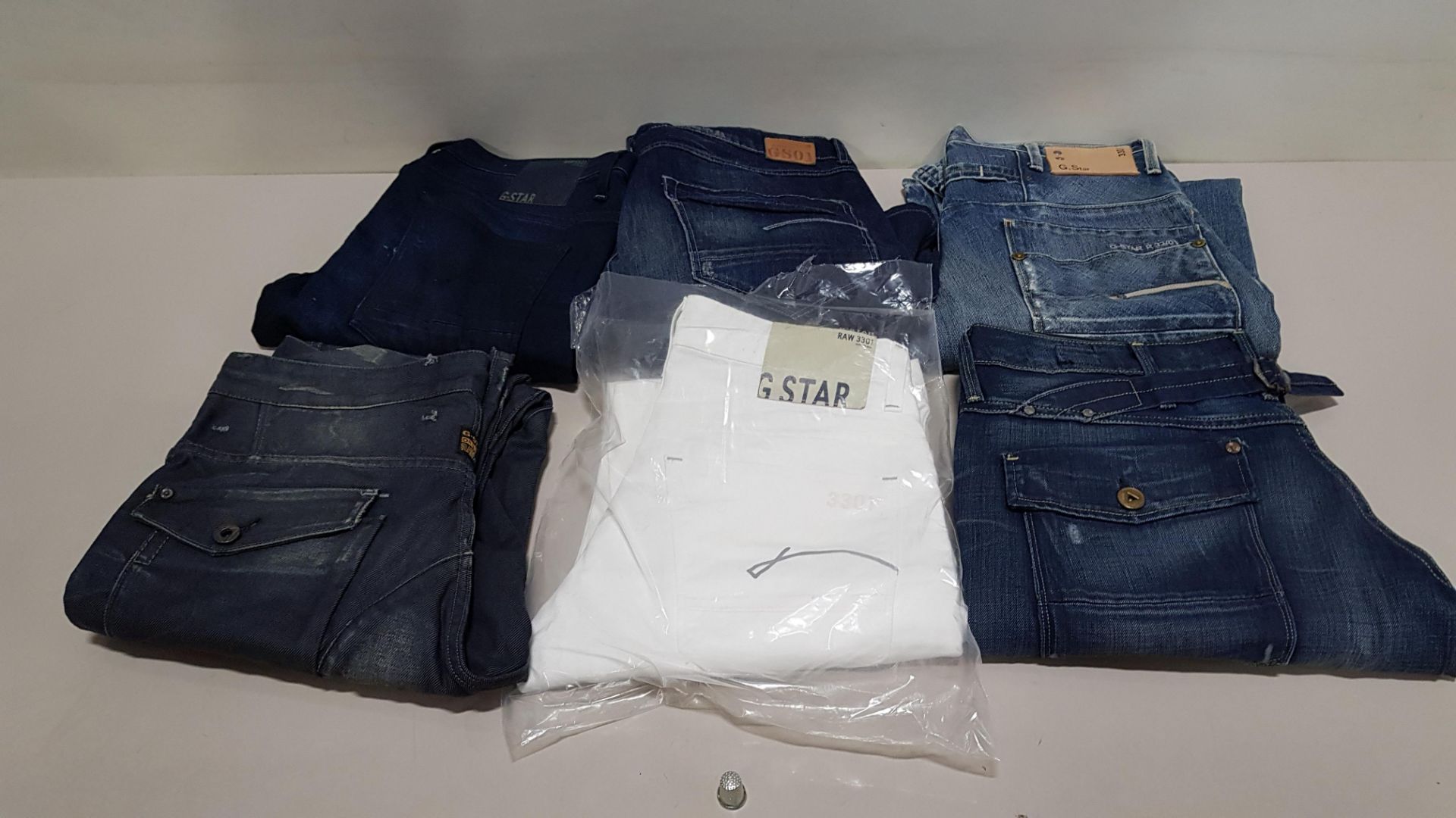 6 X PAIRS OF BRAND NEW G-STAR RAW JEANS IN VARIOUS STYLES & COLOURS IE. LIGHT BLUE, DARK BLUE, GREY,