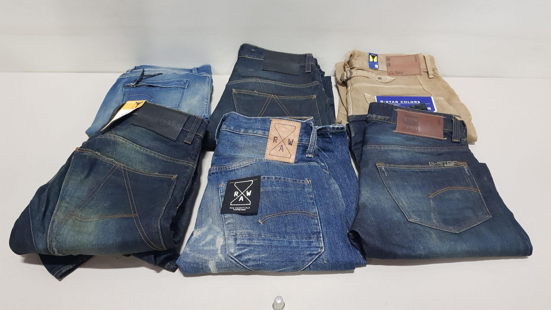 6 X PAIRS OF BRAND NEW G-STAR RAW JEANS IN VARIOUS STYLES & COLOURS IE. LIGHT BLUE, DARK BLUE AND