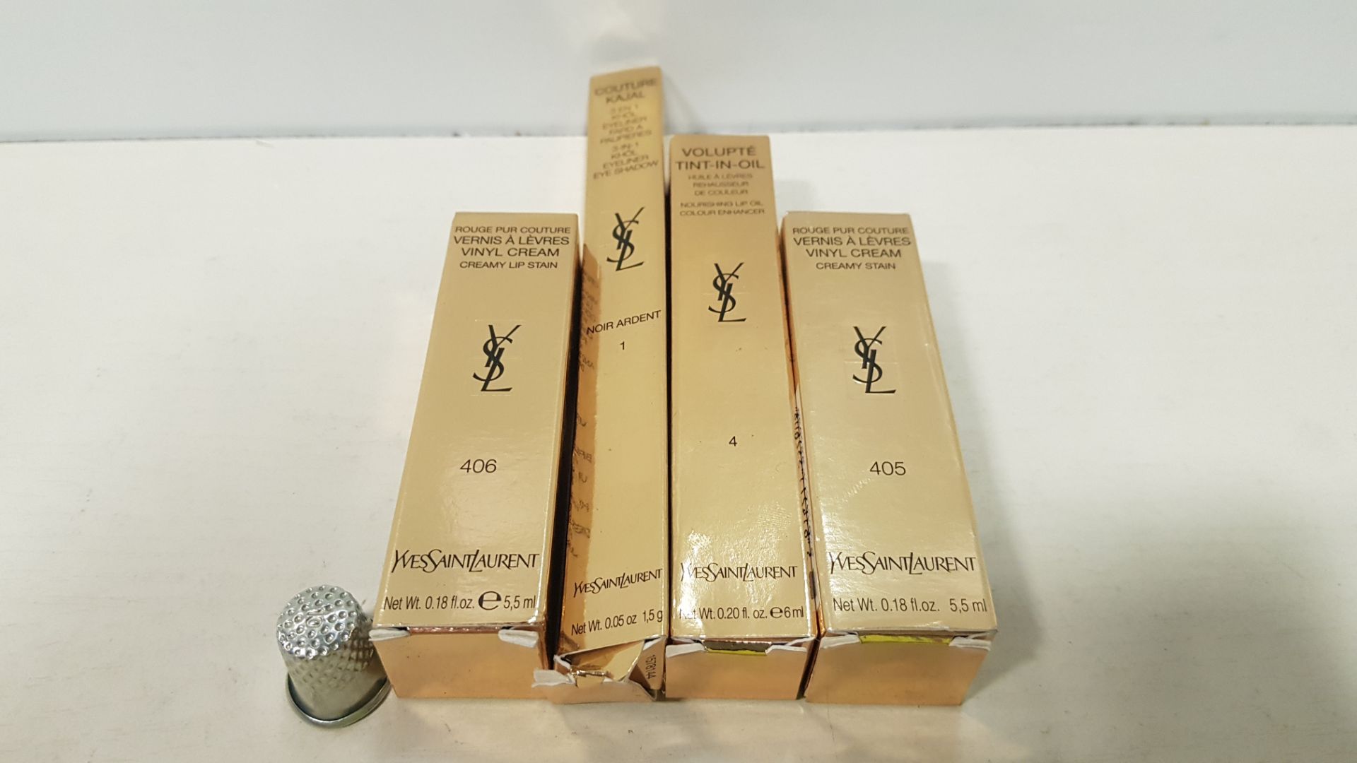 13 PIECE BRAND NEW ASSORTED YVES SAINT LAURENT LOT CONTAINING VOLUPTE TINT-IN-OIL, ROUGE PUR COUTURE
