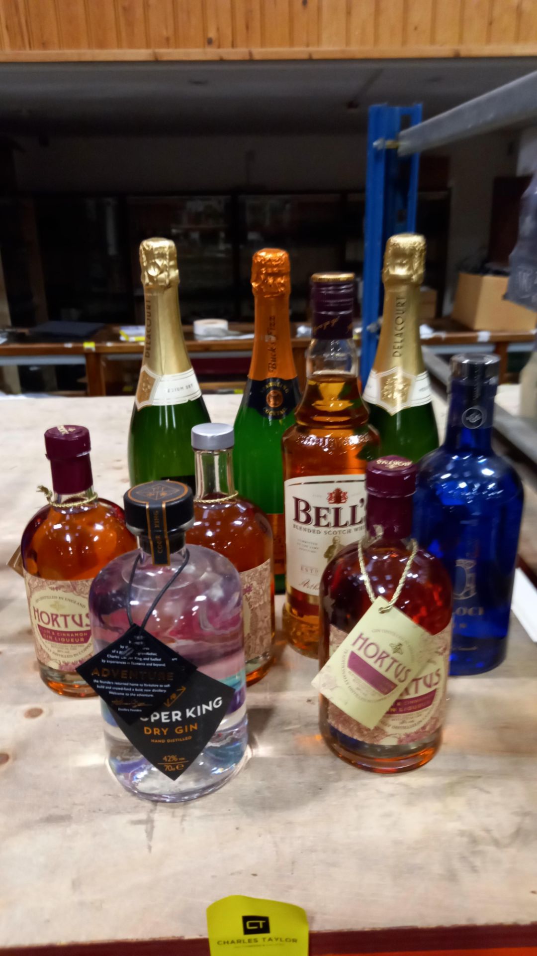 9 X BOTTLES OF ALCOHOL IE. 2 X DELACOURT CHAMPAGNE, 1 X BELLS WHISKY 70CL, 3 X HORTUS GIN 50CL, 1