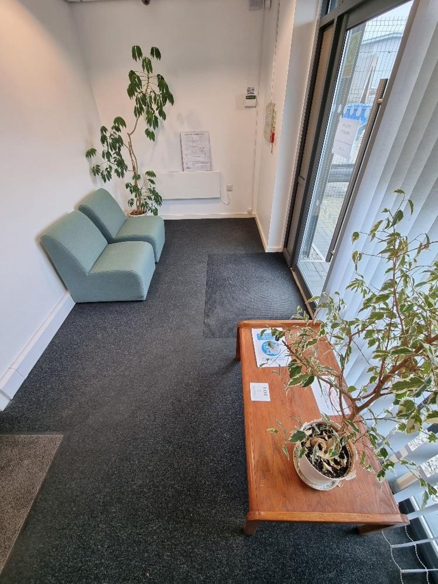 Contents of reception comprising:- 2 - chairs, coffee table and 2 - planters