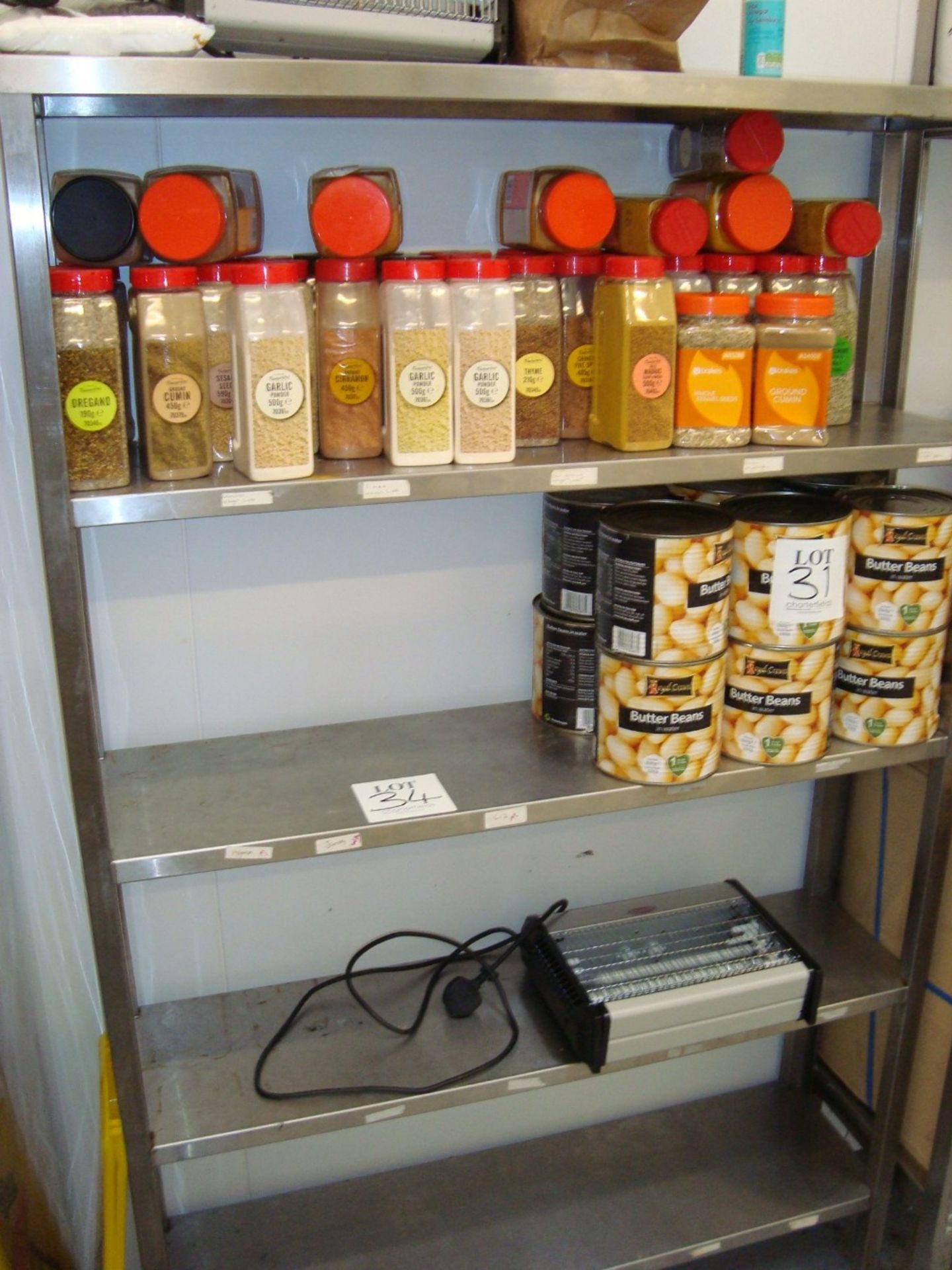 A stainless steel five shelf storage rack