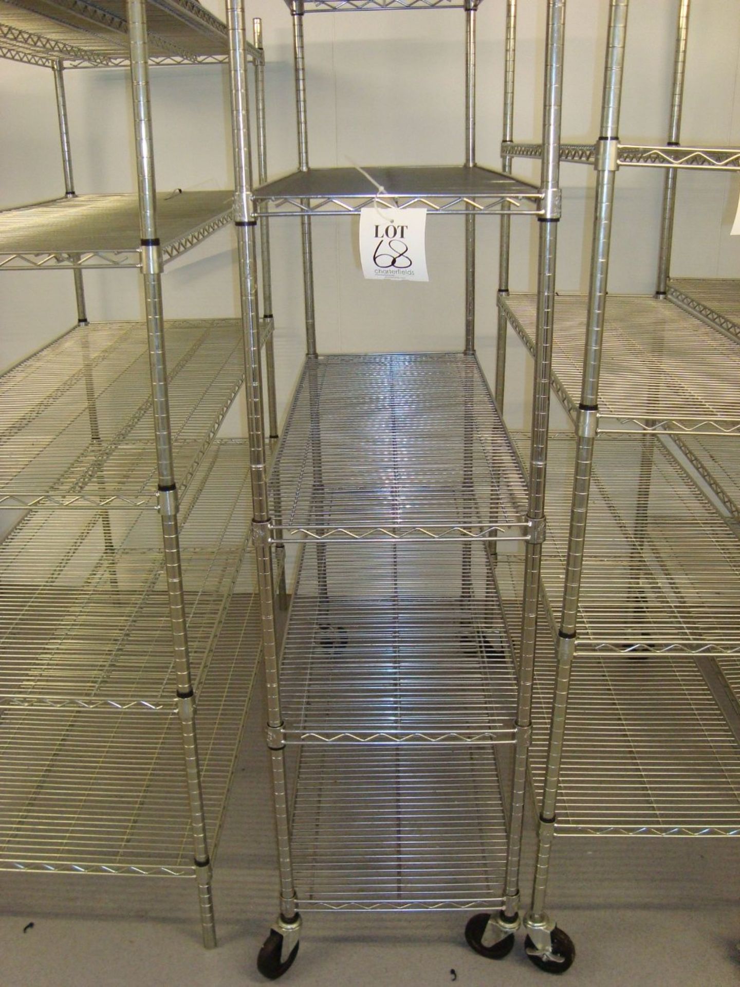 An NSF Shell Tech mobile adjustable stainless steel wire shelving rack