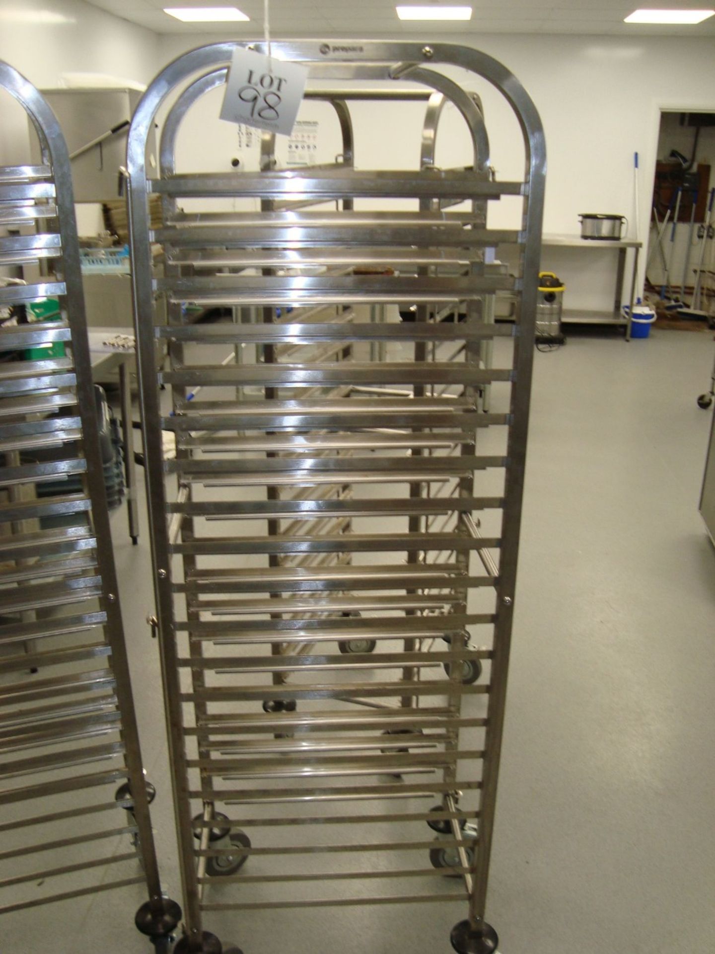 A Prepara stainless steel full height mobile tray rack