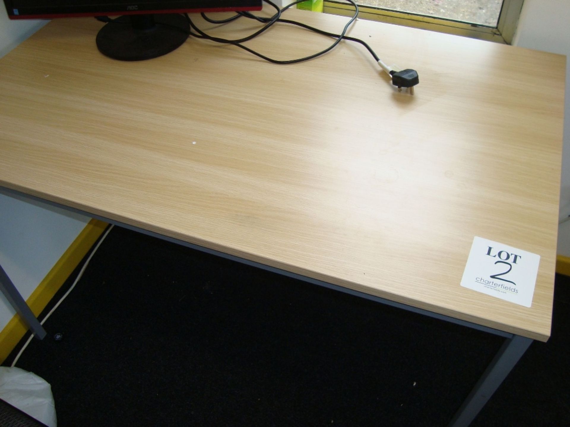 A quantity of light oak effect office furniture including four tables and a double door full