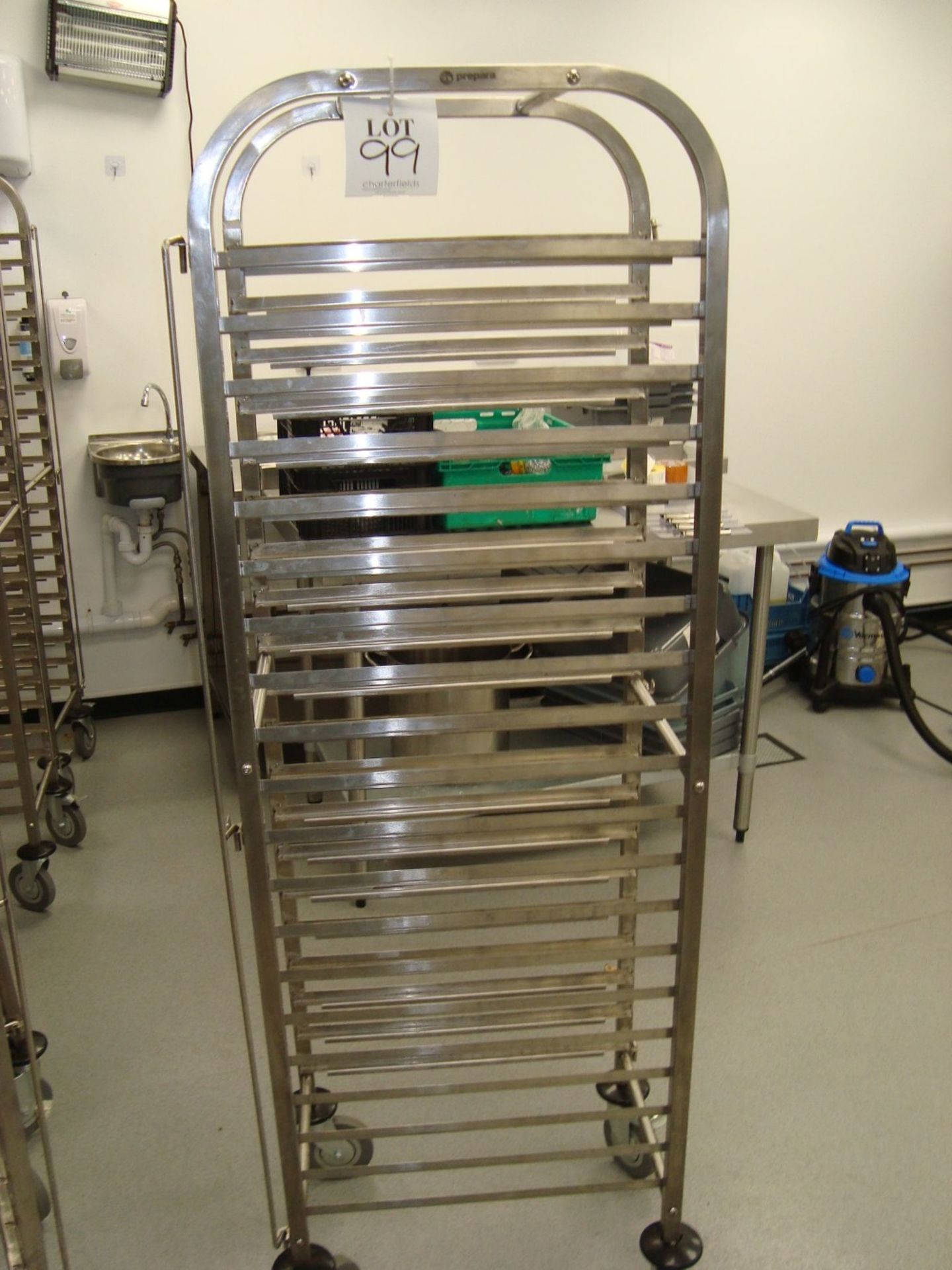 A Prepara stainless steel full height mobile tray rack