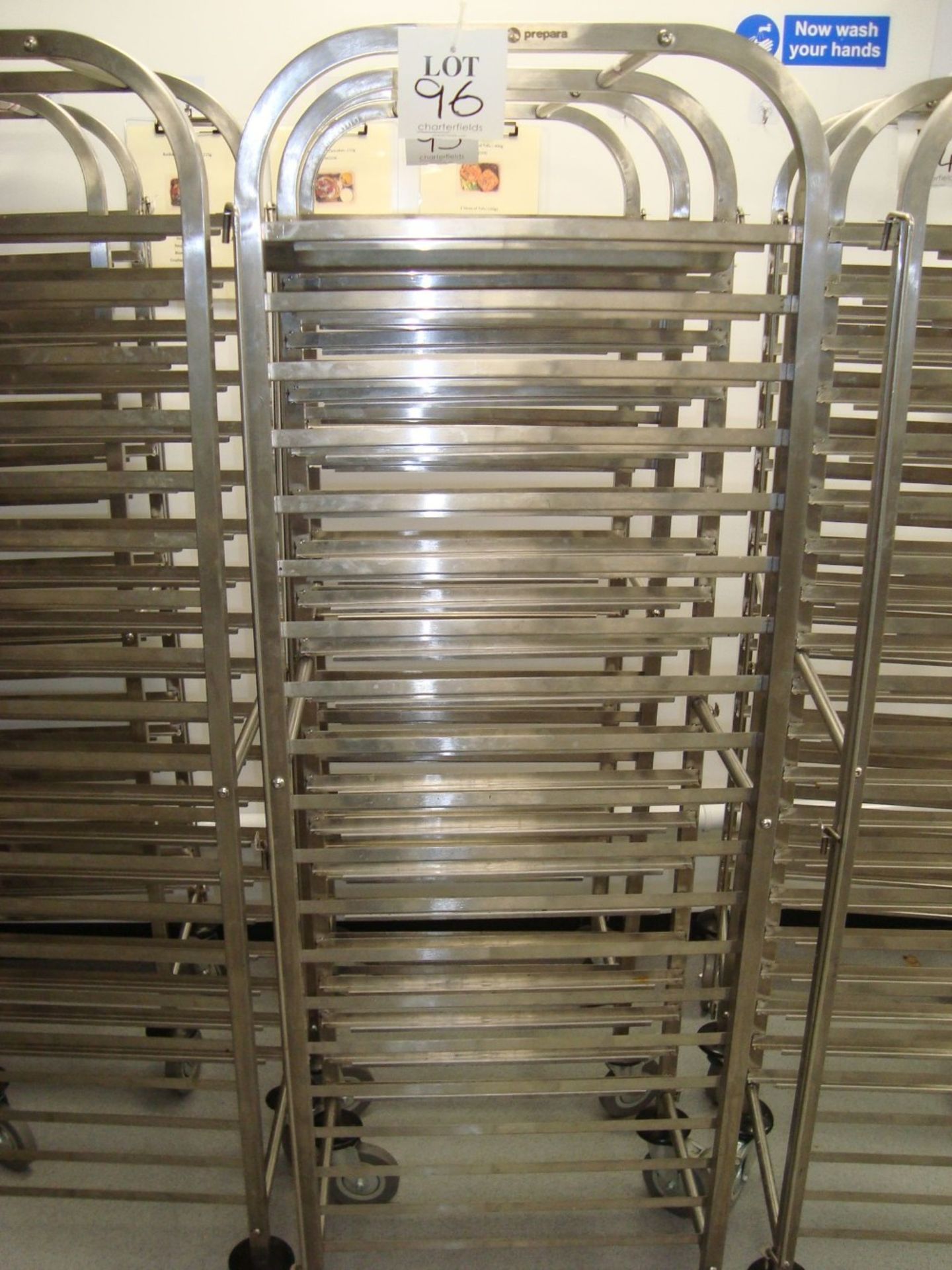 A Prepara stainless steel full height mobile tray rack