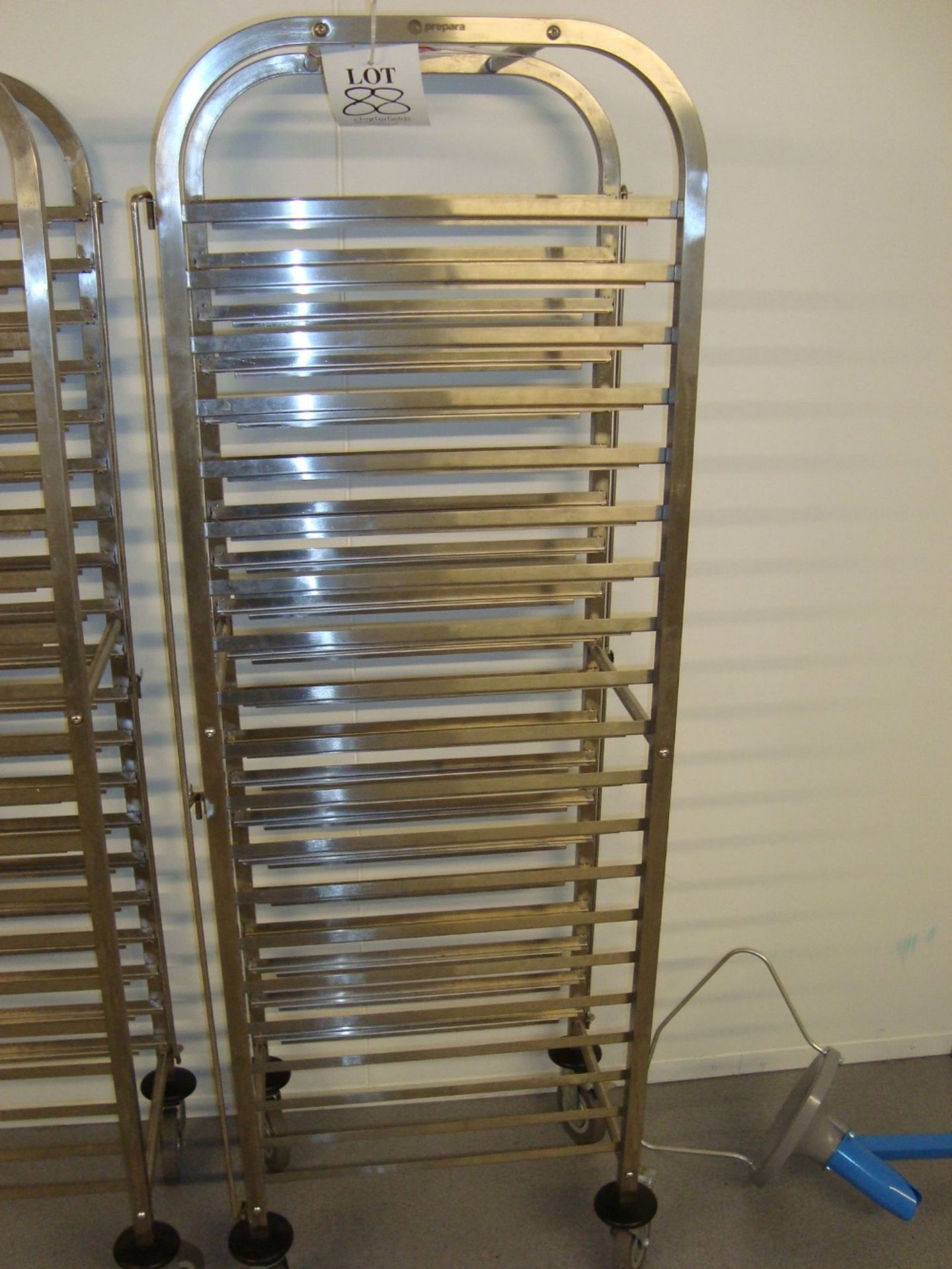 A Prepara mobile stainless steel full height tray rack