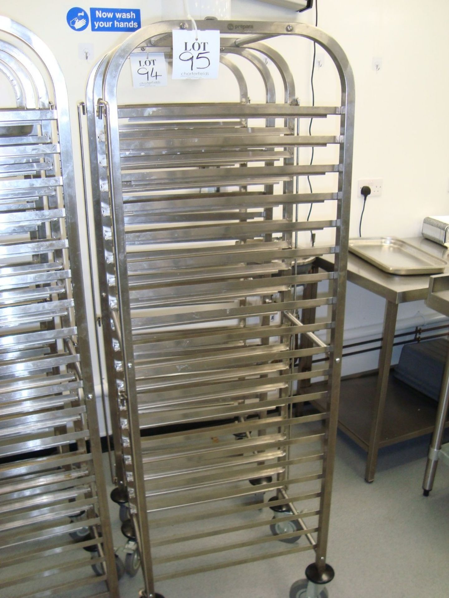 A Prepara stainless steel full height mobile tray rack