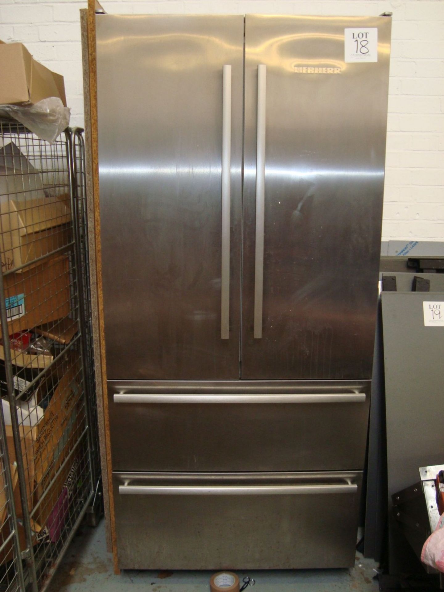 A Liebherr full height double door double drawer stainless steel fridge