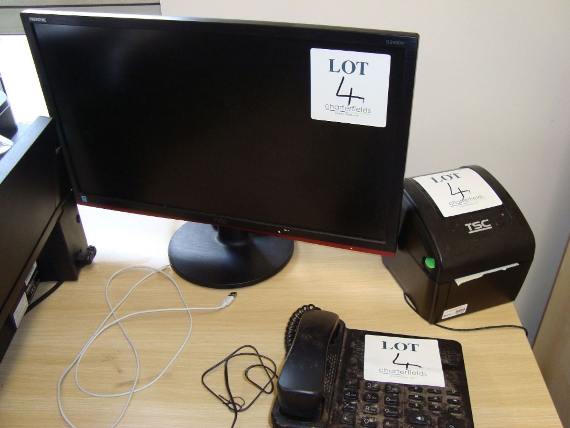 A quantity of electronic computer and office equipment including three flat screen monitors, TSC