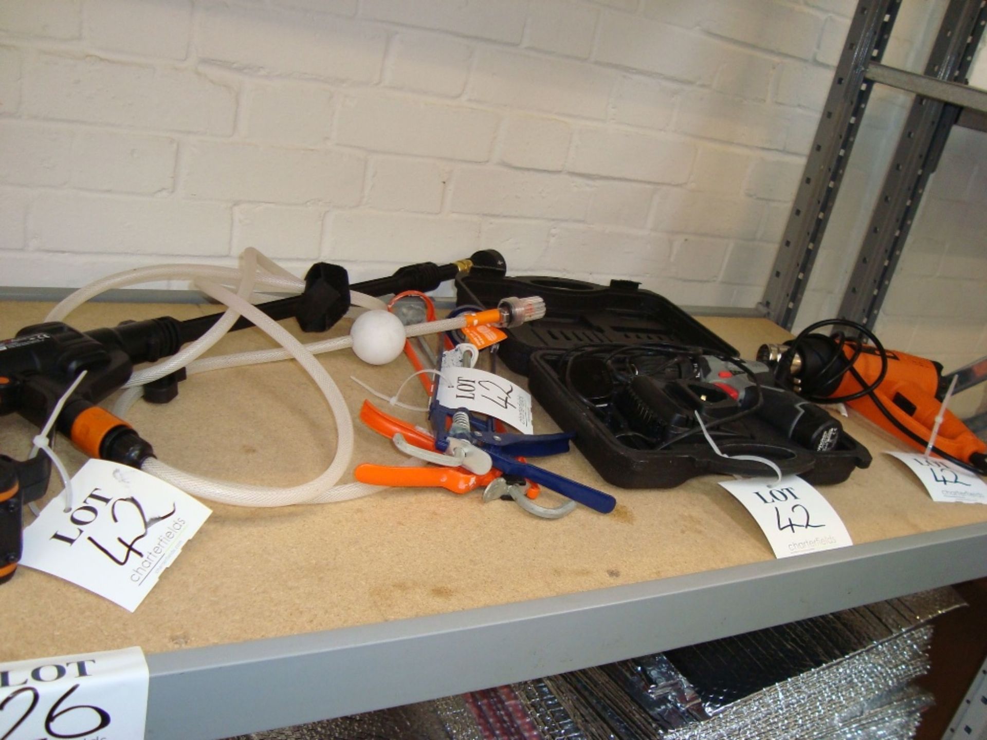 A quantity of power and hand tools including Worx pressure washer, Wickes cordless drill, Seekone