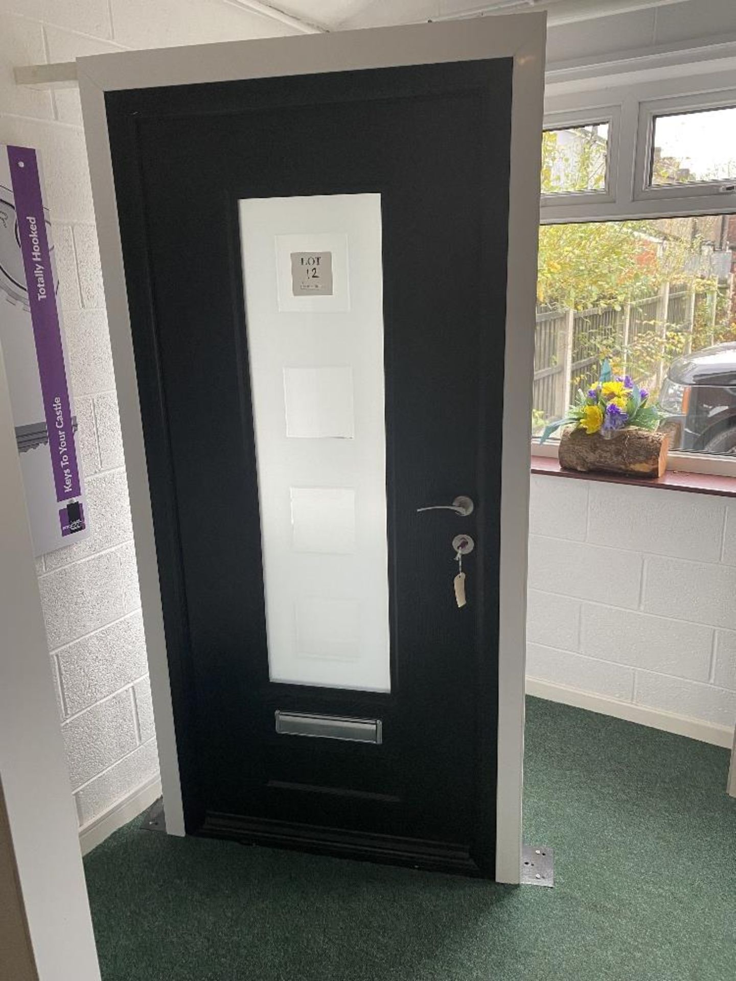 Grey upvc glazed door and frame, with key, approximate size 206cm high x 93cm wide