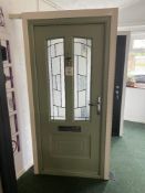 Green upvc glazed door and frame, with key, approximate size 206cm high x 93cm wide