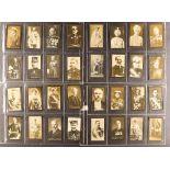 CIGARETTE CARDS in albums and in a tin, many Ogden Guinea Gold photo types, plus Players, Wills,
