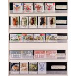 GB.ELIZABETH II COMMEMORATIVE STAMP SETS 1971 - 2003 in four stockbooks. A complete run of mint sets