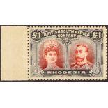 RHODESIA 1910-13 £1 carmine-red and bluish-black Double Head, SG 165, left marginal example, very